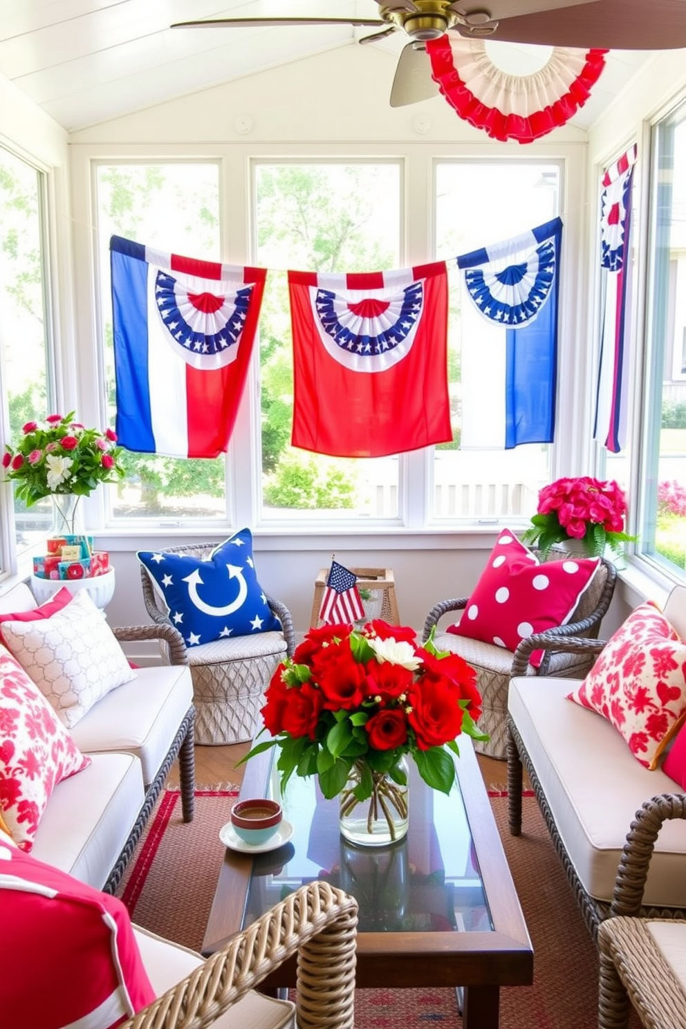 A bright and cheerful sunroom decorated for Independence Day features festive banners in red, white, and blue hanging along the walls. The space is filled with comfortable seating, vibrant throw pillows, and a table adorned with seasonal decorations and fresh flowers.