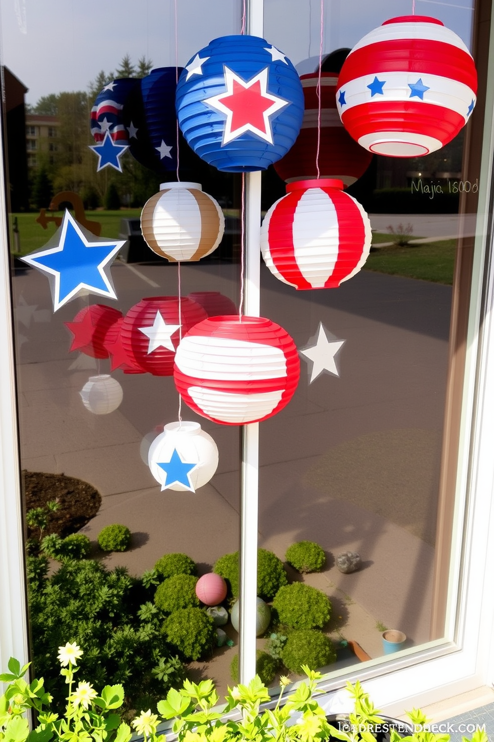 Create a festive window display featuring DIY paper lanterns in vibrant red, white, and blue colors. Each lantern should be uniquely designed, showcasing stars and stripes to celebrate Independence Day.