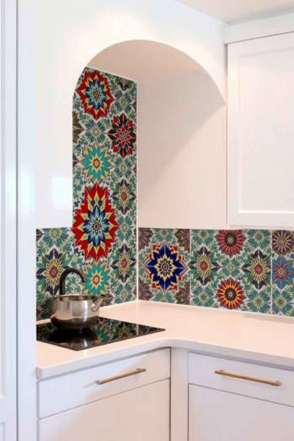 A unique kitchen alcove features a stunning backsplash adorned with intricate geometric patterns in vibrant colors. The cabinetry is a sleek, modern white, providing a striking contrast to the bold design of the backsplash.