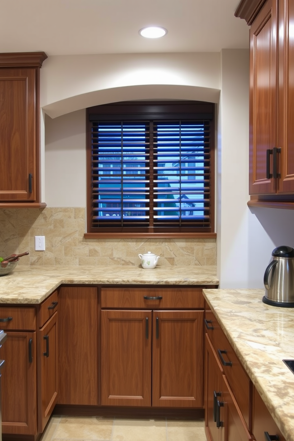 A vibrant kitchen alcove features bold red cabinets paired with sleek black countertops. Bright yellow accents in the form of bar stools and decorative items create a lively atmosphere. The walls are painted in a deep navy blue, providing a striking backdrop for the colorful elements. Large windows allow natural light to flood the space, enhancing the modern aesthetic.