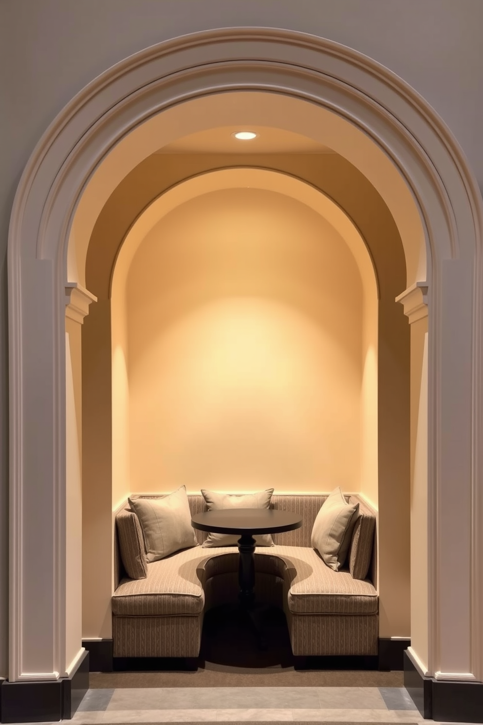 An elegant arch frames a cozy nook featuring a plush seating area with soft cushions and a small round table. The nook is adorned with warm lighting, and the walls are painted in a soft cream color, creating an inviting atmosphere.