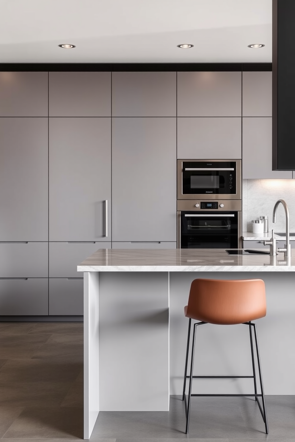 A minimalist kitchen bar design featuring sleek cabinetry with a matte finish and integrated appliances. The bar area is accentuated by a simple island with a polished stone countertop and minimalist bar stools.