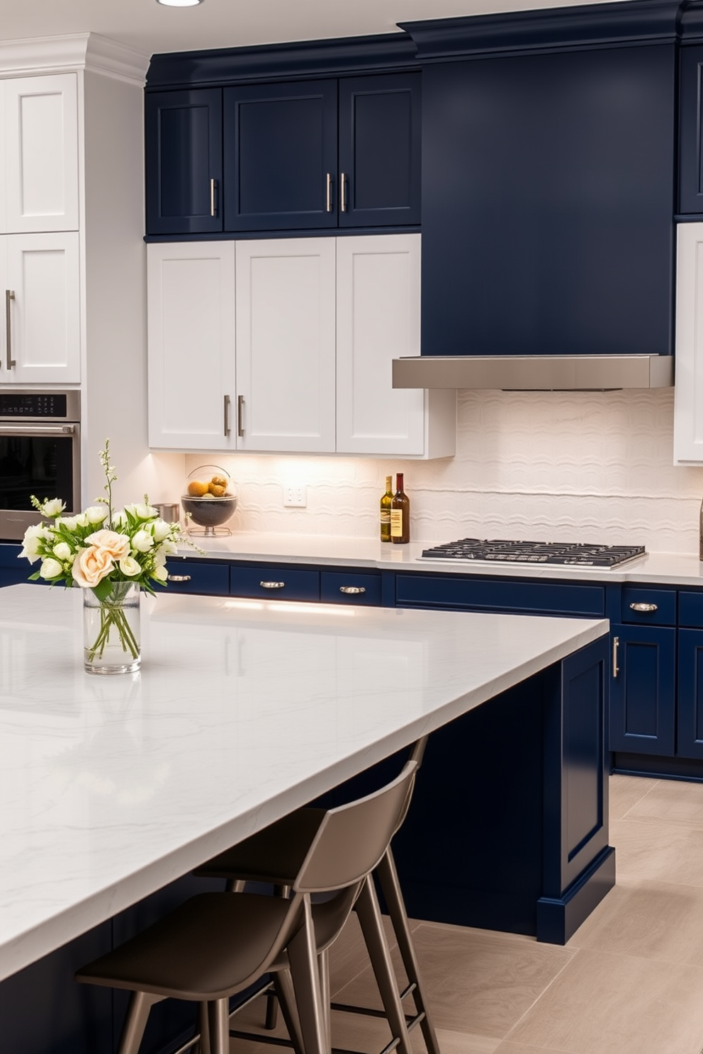 A striking kitchen featuring two-tone cabinets that create a bold contrast. The upper cabinets are a soft white, while the lower cabinets are a deep navy blue, adding depth and sophistication to the space. The countertops are made of sleek quartz in a light gray hue, complementing the cabinetry. A large island sits at the center, topped with a waterfall edge, and adorned with stylish bar stools for casual dining.