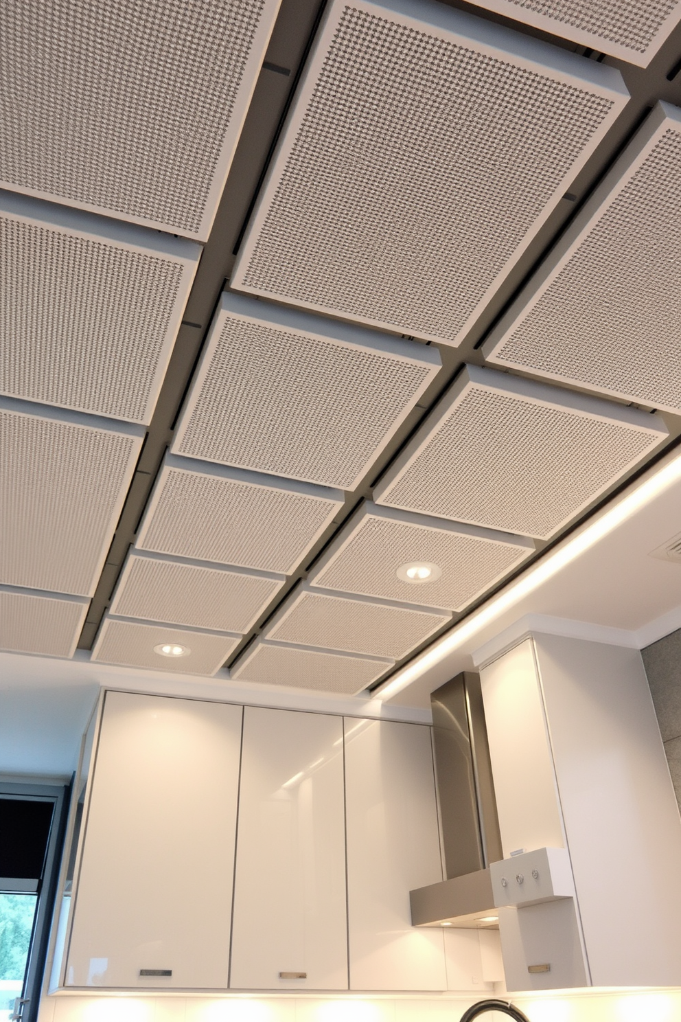 A modern kitchen featuring acoustic tiles designed for sound absorption. The ceiling is adorned with a series of textured panels that enhance both aesthetics and functionality. The tiles are arranged in a geometric pattern, creating visual interest while minimizing noise. Soft, ambient lighting is integrated into the design, highlighting the unique ceiling features.