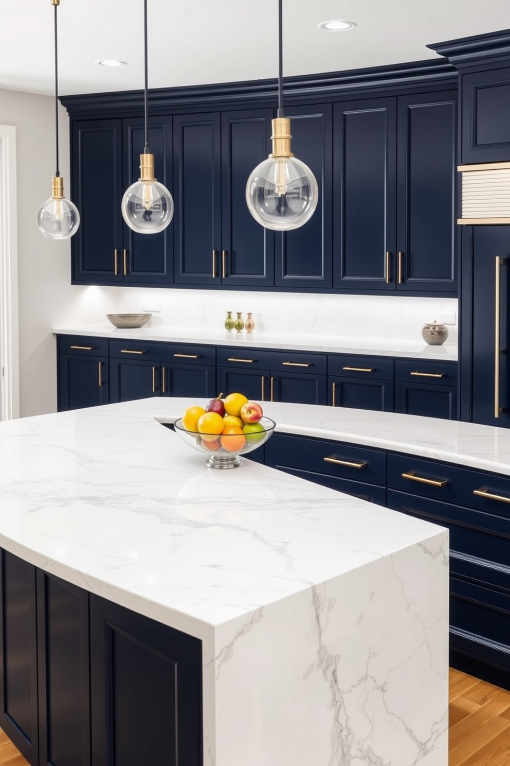 A sleek kitchen setting featuring quartz countertops with subtle veining that add a touch of elegance. The cabinetry is a soft white, complementing the natural tones of the countertops and creating a bright and inviting atmosphere.