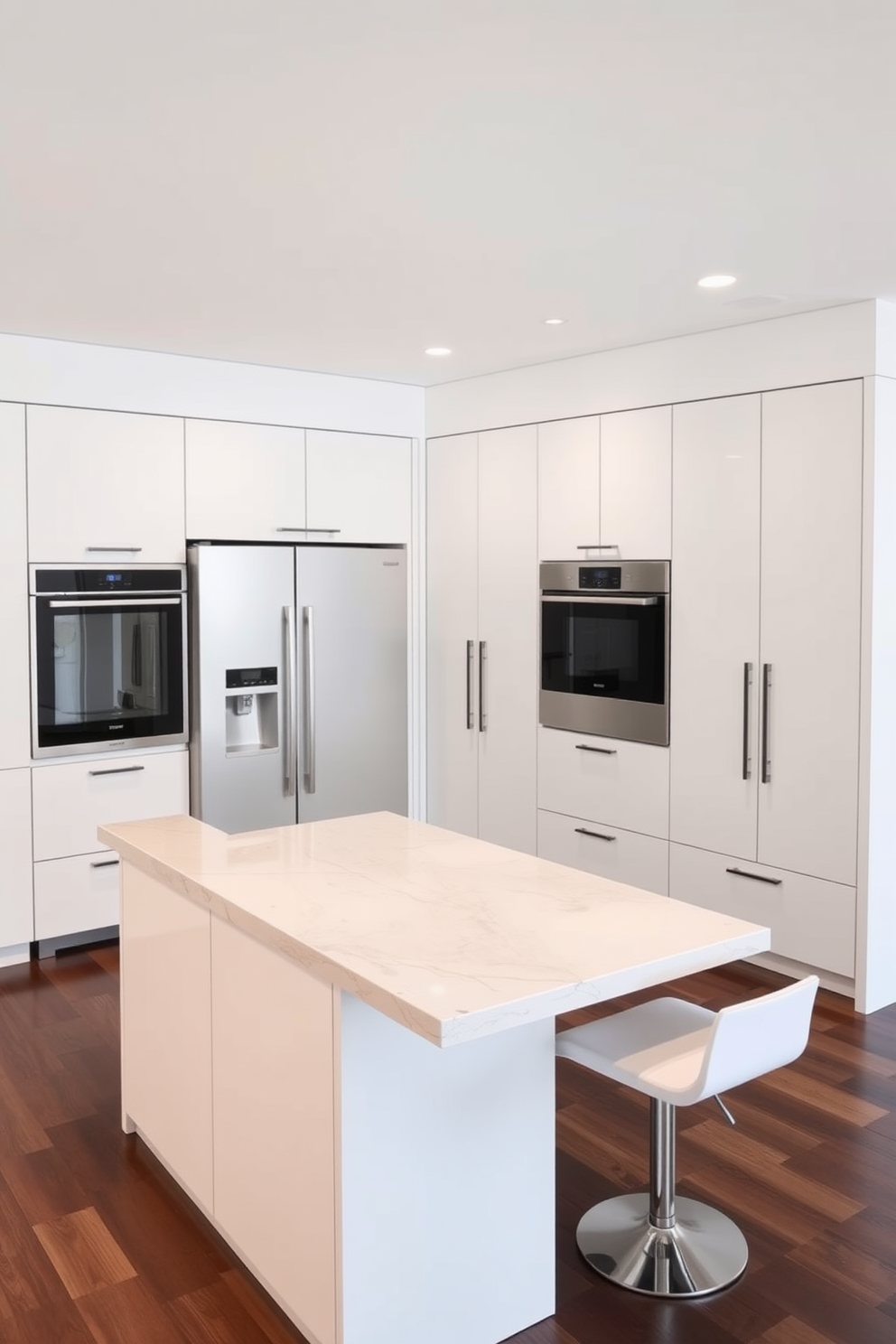 A contemporary kitchen featuring integrated appliances that blend seamlessly with the cabinetry. The sleek design includes a large island with a waterfall countertop and bar seating, surrounded by minimalist cabinetry in a soft white finish. The refrigerator and oven are cleverly concealed behind matching cabinet doors, creating a cohesive aesthetic. A stylish backsplash with geometric tiles adds a touch of texture and visual interest to the space.