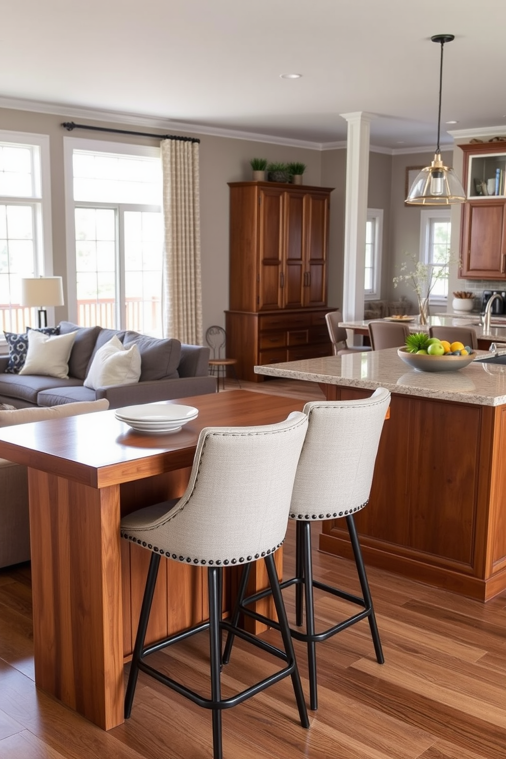 A cozy family room featuring a casual dining area with stylish bar stools. The bar stools are upholstered in soft fabric with a contemporary design, complementing the warm wood tones of the kitchen island. The kitchen boasts an open layout, seamlessly connecting to the family room. Large windows allow natural light to flood the space, enhancing the inviting atmosphere for family gatherings.