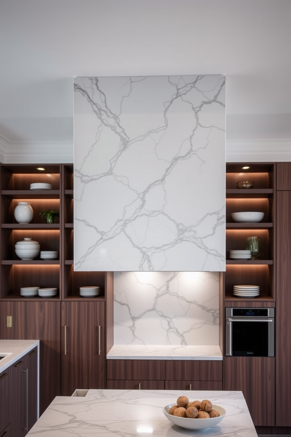 An elegant marble hood elegantly suspended above the kitchen island creates a stunning focal point. The intricate veining of the marble complements the sleek cabinetry and enhances the overall sophistication of the space. Soft lighting from recessed fixtures highlights the texture of the marble, adding warmth to the modern design. Surrounding the hood, open shelving showcases curated dishware and decorative items, blending functionality with style.