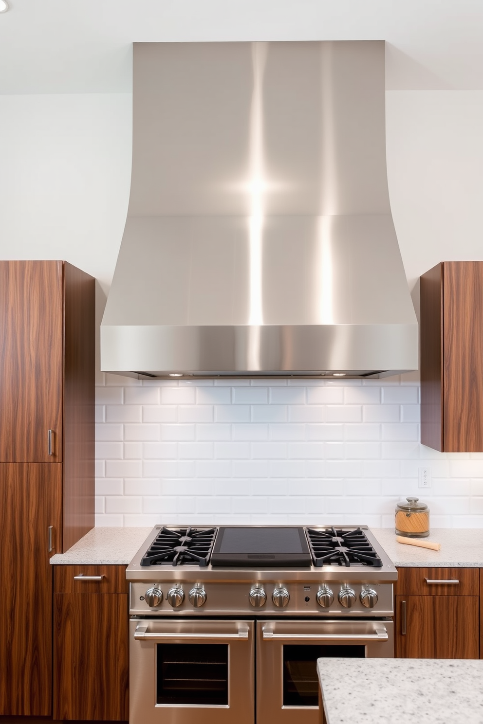 Art deco inspired kitchen hood featuring geometric patterns and a polished brass finish that adds a touch of elegance. The hood is complemented by vintage-style cabinetry painted in deep emerald green, creating a striking contrast.