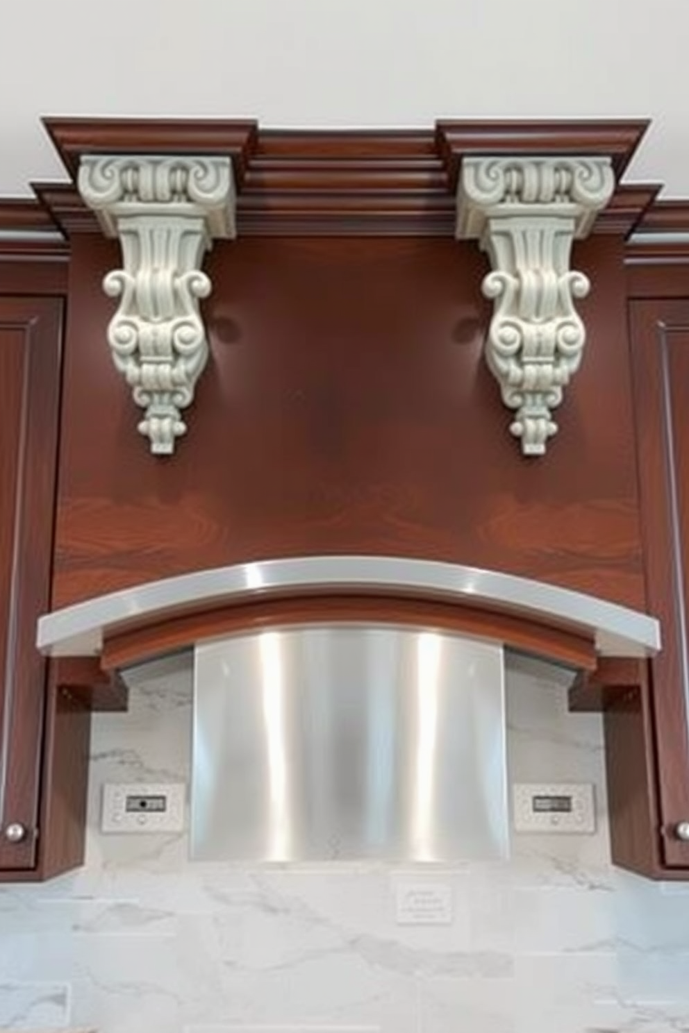 A stunning kitchen hood design featuring decorative corbels that add intricate detail and elegance. The hood is crafted from rich wood, complemented by a sleek stainless steel insert that enhances the modern aesthetic of the kitchen.