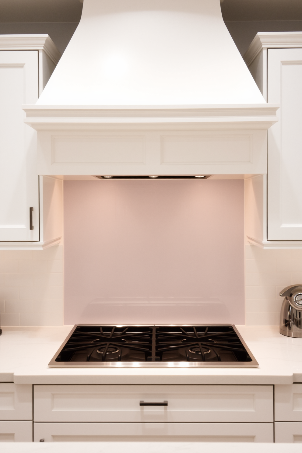 A simple white kitchen hood with clean lines is the focal point of this modern kitchen. The hood seamlessly integrates into the cabinetry, creating an elegant and minimalist aesthetic.