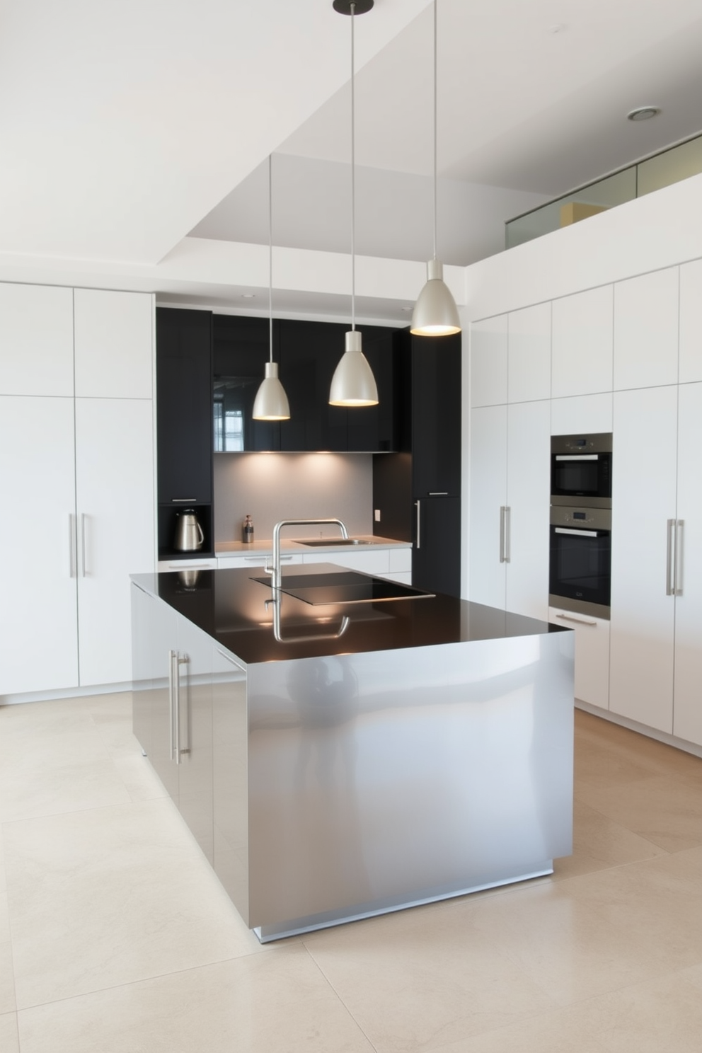 A sleek stainless steel island serves as the centerpiece of a modern kitchen. The island features a polished surface and integrated appliances, surrounded by minimalist cabinetry in a soft white finish. Bright pendant lights hang above, illuminating the space and highlighting the contemporary design. The floor is adorned with large format tiles in a neutral tone, complementing the overall aesthetic.