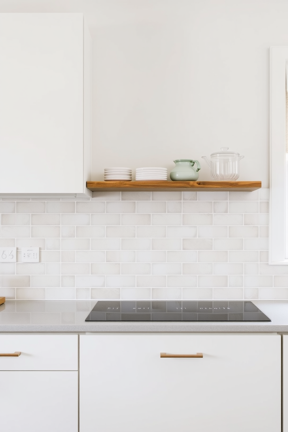 A serene kitchen space featuring pastel colored tiles that create a soft and inviting palette. The tiles are arranged in a subtle herringbone pattern, enhancing the overall aesthetic while providing a fresh look to the kitchen walls. Above the tiled backsplash, sleek white cabinetry complements the soft hues, creating a harmonious balance. A rustic wooden shelf displays curated kitchenware, adding warmth and character to the design.