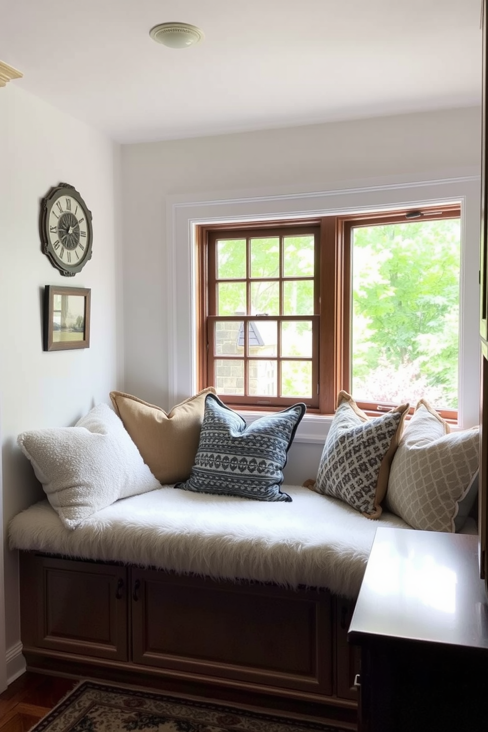 A cozy window seat is adorned with plush cushions and decorative pillows in various textures and colors. The surrounding area features a charming kitchen window that allows natural light to flood the space, enhancing the inviting atmosphere.