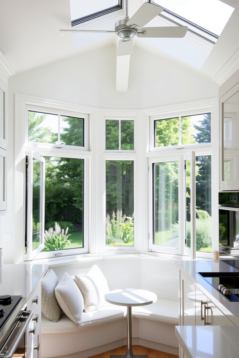 A bright and airy kitchen features a large window adorned with stunning stained glass accents that filter sunlight into a spectrum of colors. The window is framed with white wood, complementing the light-colored cabinetry and creating a warm and inviting atmosphere. Below the window, a cozy breakfast nook is set with a round wooden table and colorful upholstered chairs that echo the hues of the stained glass. Potted herbs on the windowsill add a touch of greenery and freshness to the space, enhancing the overall aesthetic.