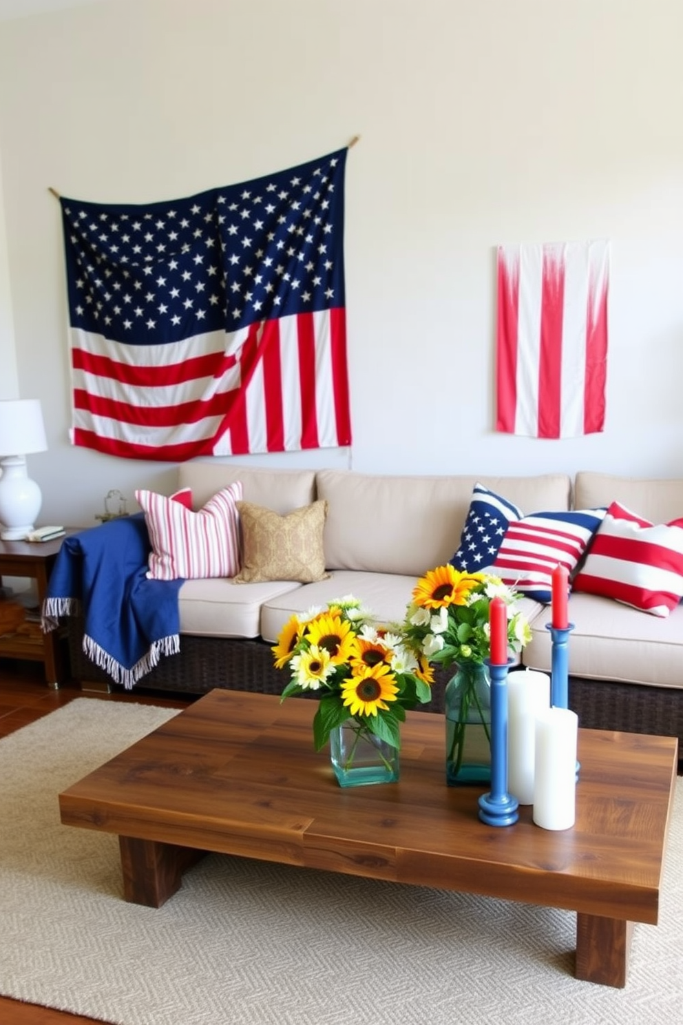 A stylish living room designed for Labor Day celebrations. The space features a cozy sectional sofa adorned with red, white, and blue throw pillows, complemented by a rustic coffee table made of reclaimed wood. Seasonal decor enhances the festive atmosphere, with a large American flag draped artfully on the wall. Fresh flowers in a vase, featuring sunflowers and daisies, are placed on the table alongside decorative candles in patriotic colors.