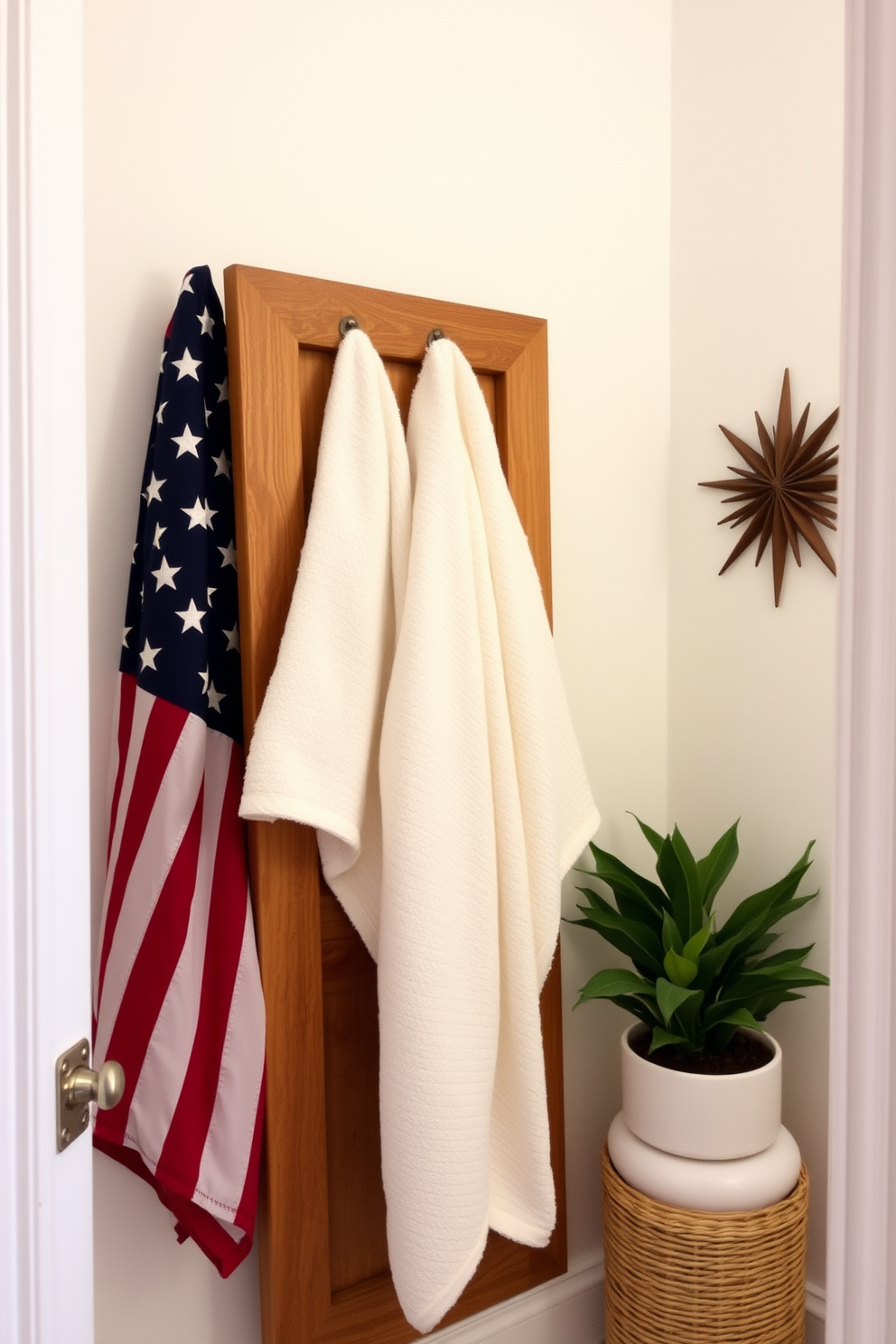 A serene bathroom retreat featuring soft textured towels draped elegantly over a wooden towel rack. The space is adorned with subtle decorations that evoke a sense of relaxation and comfort, perfect for Labor Day celebrations.