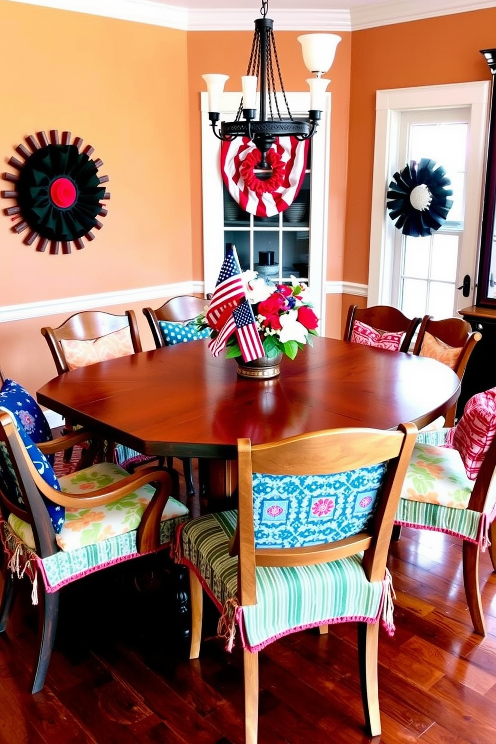 A vibrant dining room featuring a large wooden table surrounded by eclectic chairs. Each chair is adorned with colorful cushions in various patterns, creating a lively and inviting atmosphere. The walls are painted in a warm, neutral tone, complemented by seasonal Labor Day decorations. A centerpiece of fresh flowers and patriotic-themed accents adds a festive touch to the dining experience.