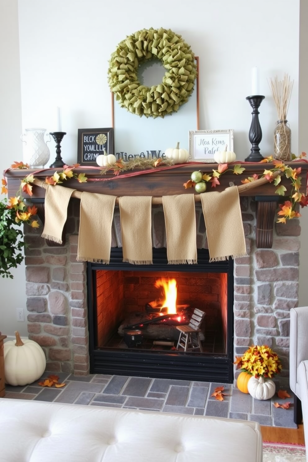 A cozy living room adorned for Labor Day features a beautifully decorated fireplace mantel. Above the mantel, a vibrant seasonal wreath made of red, white, and blue flowers adds a festive touch.