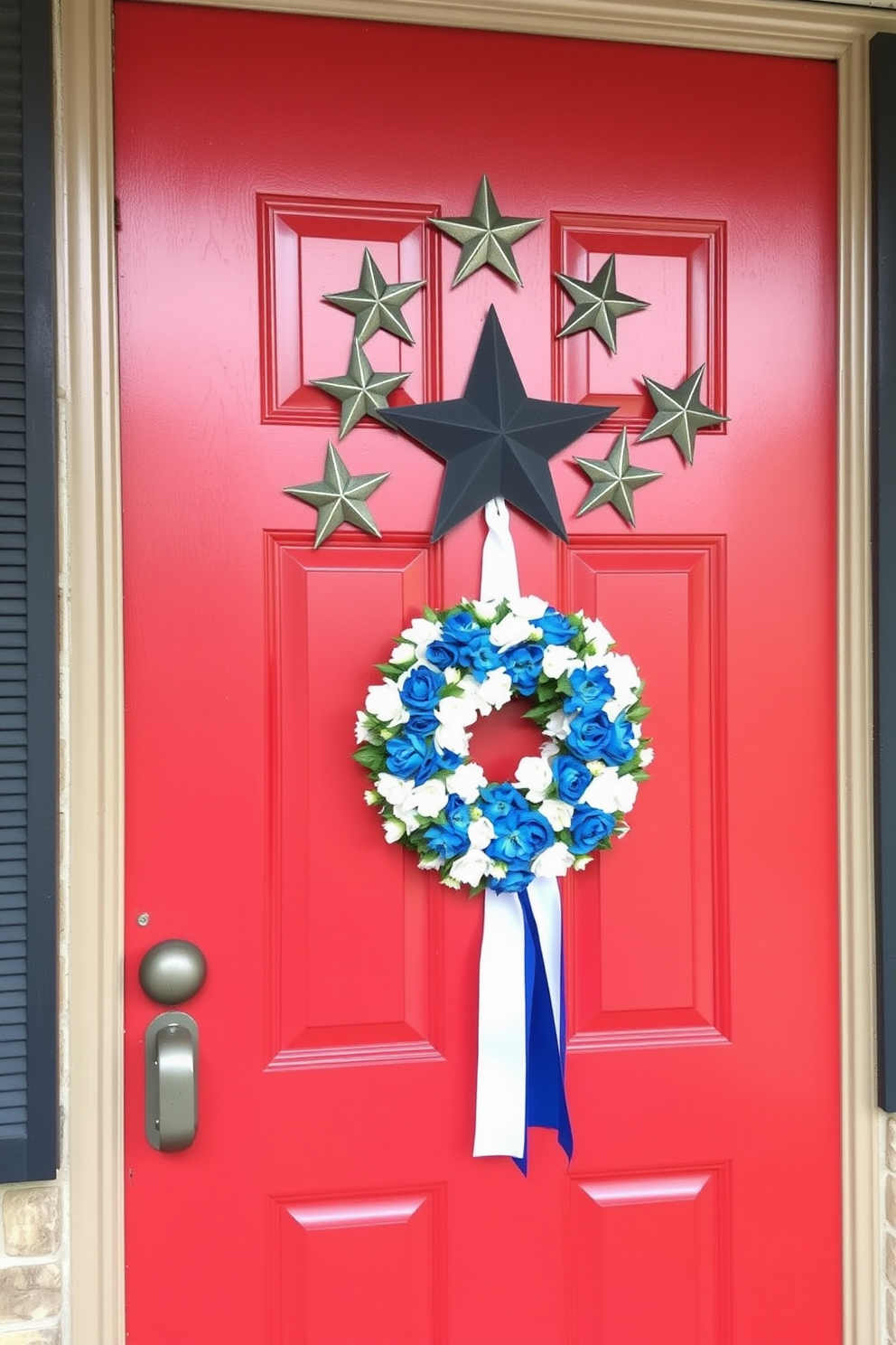 A striking front door adorned with metal stars and stripes wall art creates a festive and welcoming atmosphere for Labor Day. The door is painted in a bold red hue, complemented by a cheerful wreath made of white and blue flowers, enhancing the patriotic theme.