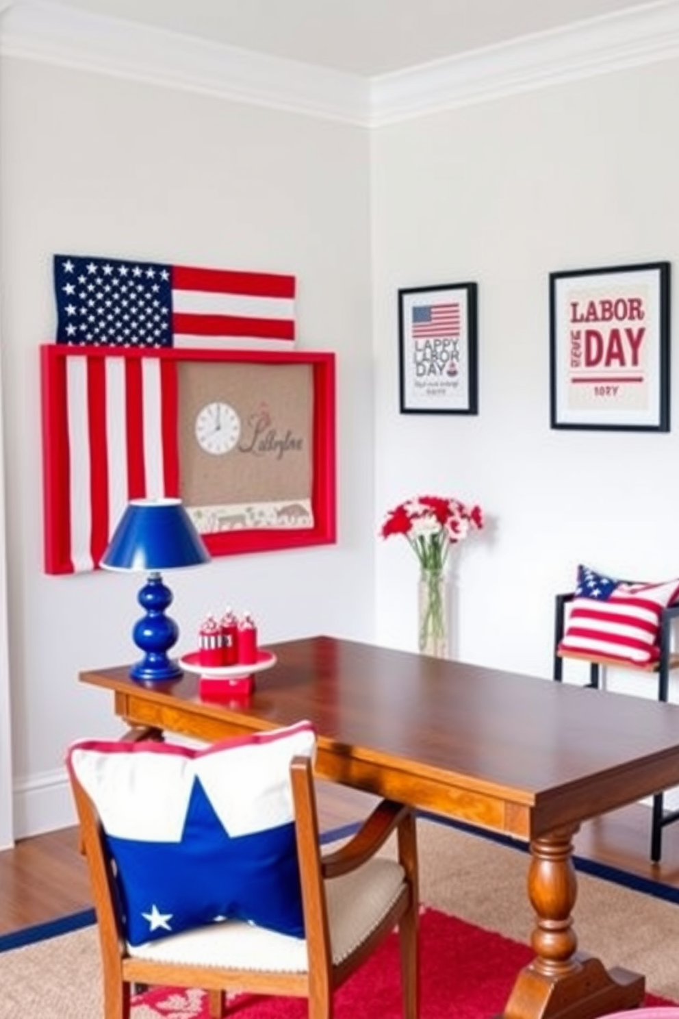 A patriotic home office setting featuring a red white and blue color scheme. The walls are painted in a crisp white, accented with bold red and navy blue decor elements. A large wooden desk sits in the center, adorned with a blue desk lamp and red accessories. A comfortable chair with a star-patterned cushion complements the theme, while framed artwork celebrating Labor Day hangs on the walls.