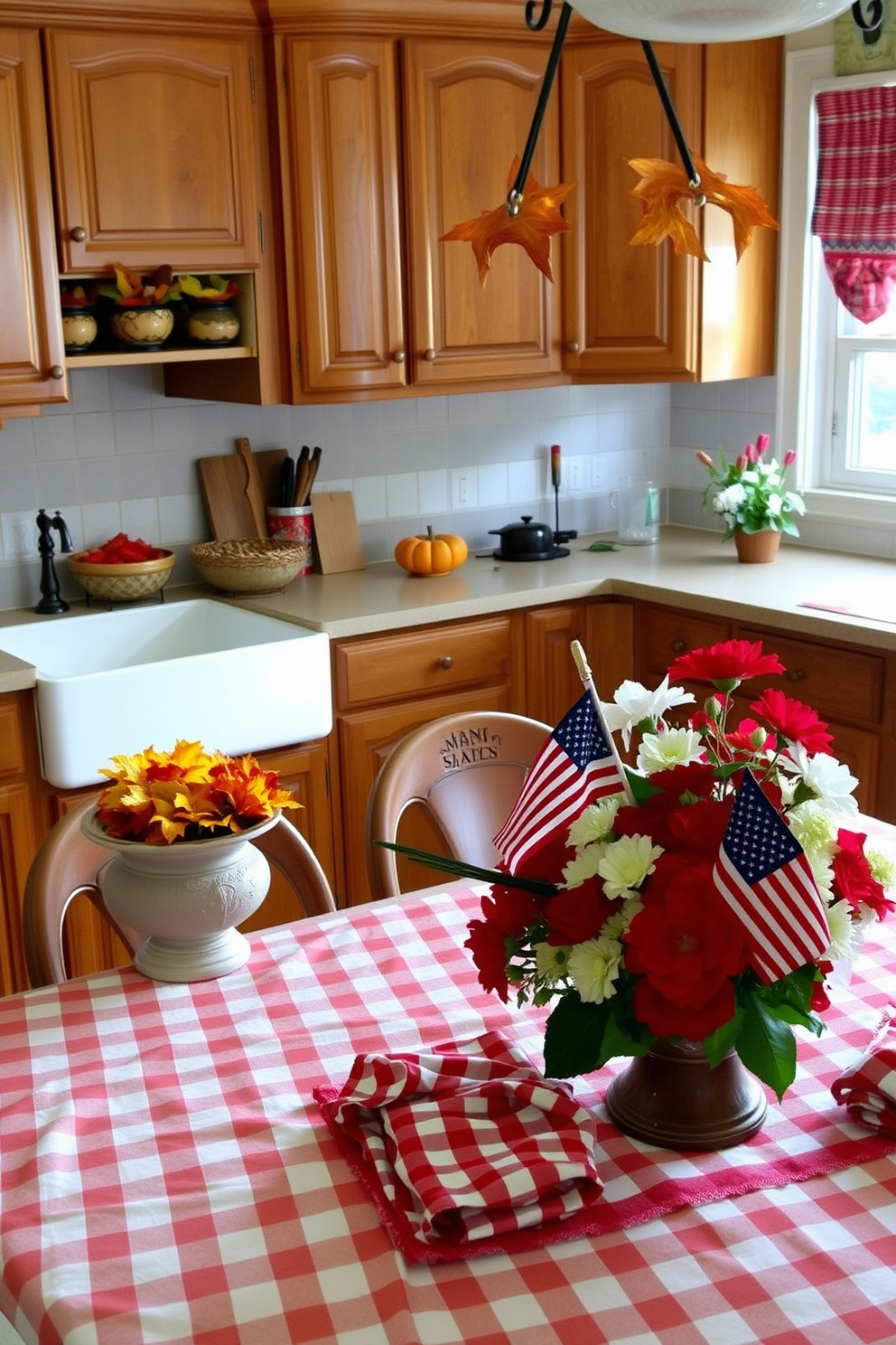 A cozy kitchen setting adorned with vibrant seasonal potpourri displayed in decorative bowls. The kitchen features warm wooden cabinets and a farmhouse sink, with colorful autumn leaves and spices creating a welcoming atmosphere. For Labor Day, the kitchen is decorated with red white and blue accents. A festive table setting includes a checkered tablecloth and fresh flowers, inviting family and friends to celebrate together.