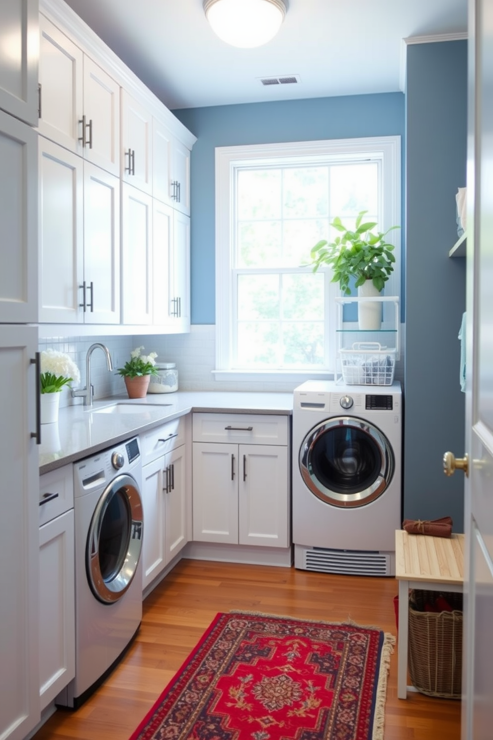 A bright and airy laundry room features crisp white cabinetry paired with soft navy blue accents. The countertops are a light gray, providing a fresh contrast to the warm wood flooring. A large window allows natural light to flood the space, enhancing the cheerful atmosphere. Decorative elements include a vibrant red rug and potted plants that bring a touch of nature indoors.