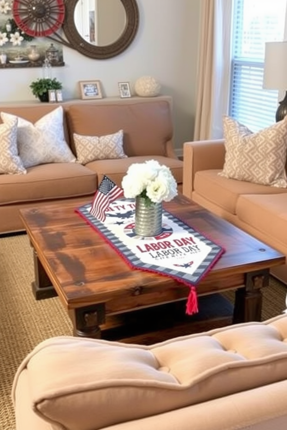 A cozy small living room features a stylish table runner adorned with patriotic motifs celebrating Labor Day. The runner is placed on a rustic wooden coffee table surrounded by plush seating in warm tones, creating an inviting atmosphere.