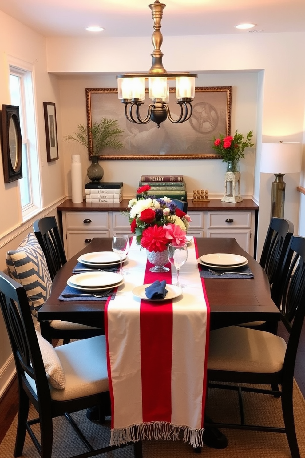 A festive table setting for Labor Day features a red white and blue table runner that adds a patriotic touch. The table is adorned with simple yet elegant dishware and fresh flowers in complementary colors to enhance the decor. In a cozy small space, the dining area is thoughtfully arranged to maximize functionality while maintaining style. Decorative accents and strategic lighting create an inviting atmosphere, perfect for celebrating the holiday with friends and family.