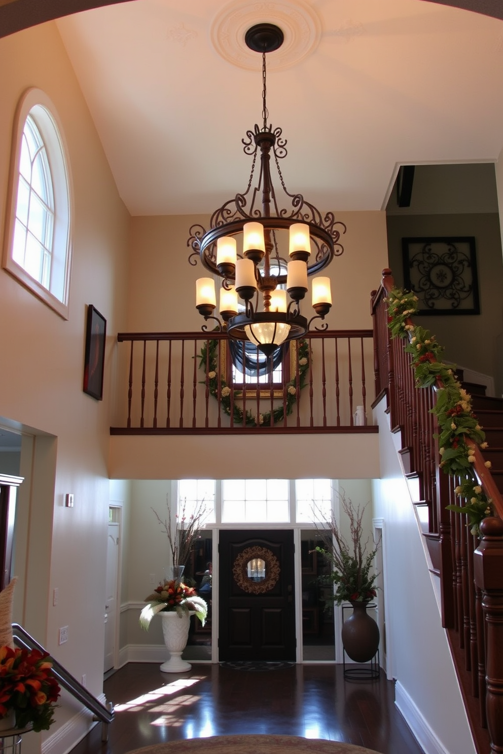 A stunning staircase adorned with a decorative chandelier that casts a warm glow. The staircase features elegant wooden railings and is flanked by carefully arranged seasonal decor inspired by Labor Day.