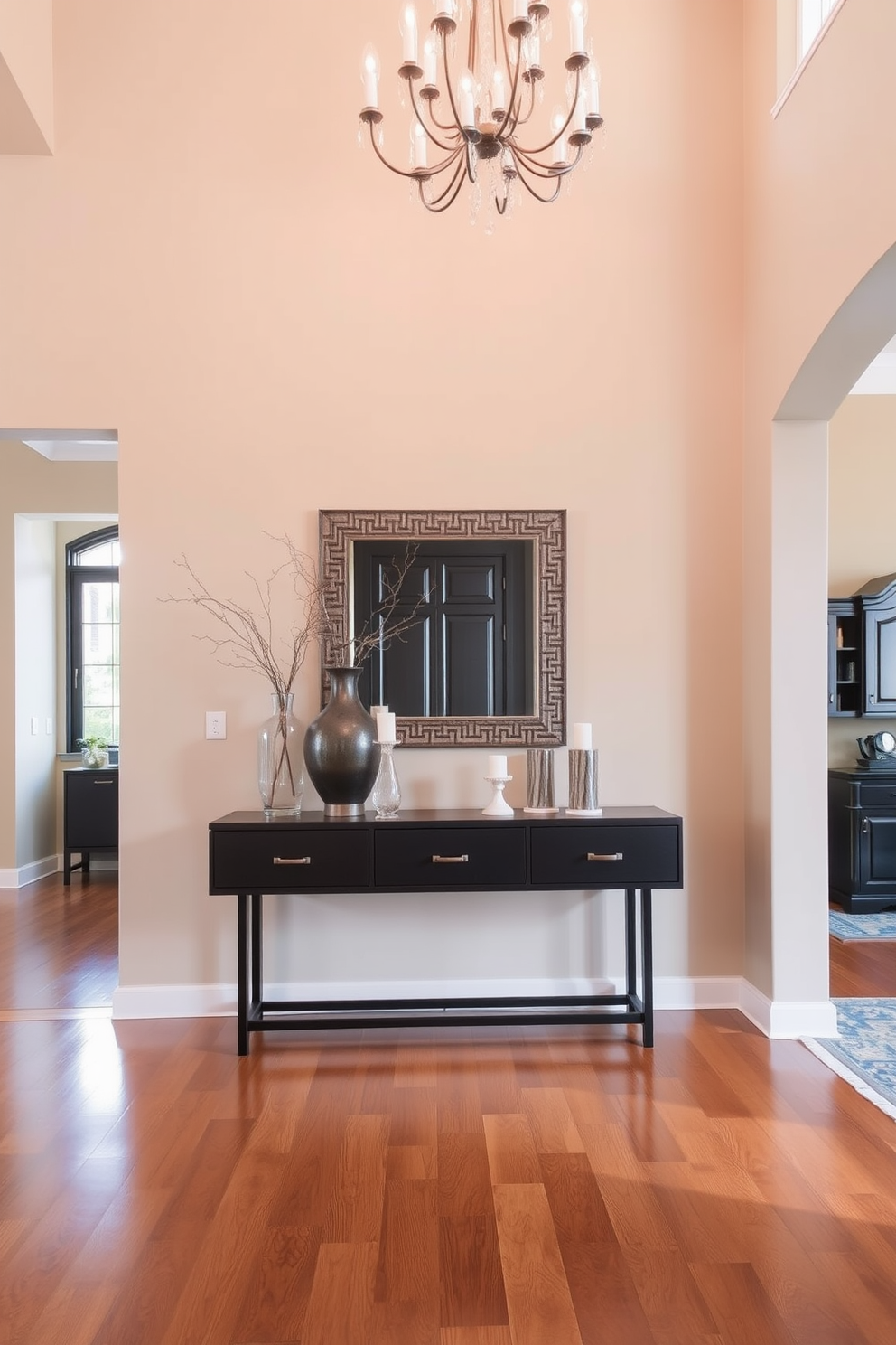 A large foyer featuring a statement mirror that reflects natural light and creates an inviting atmosphere. The space is adorned with elegant lighting fixtures and a plush area rug that adds warmth and texture.