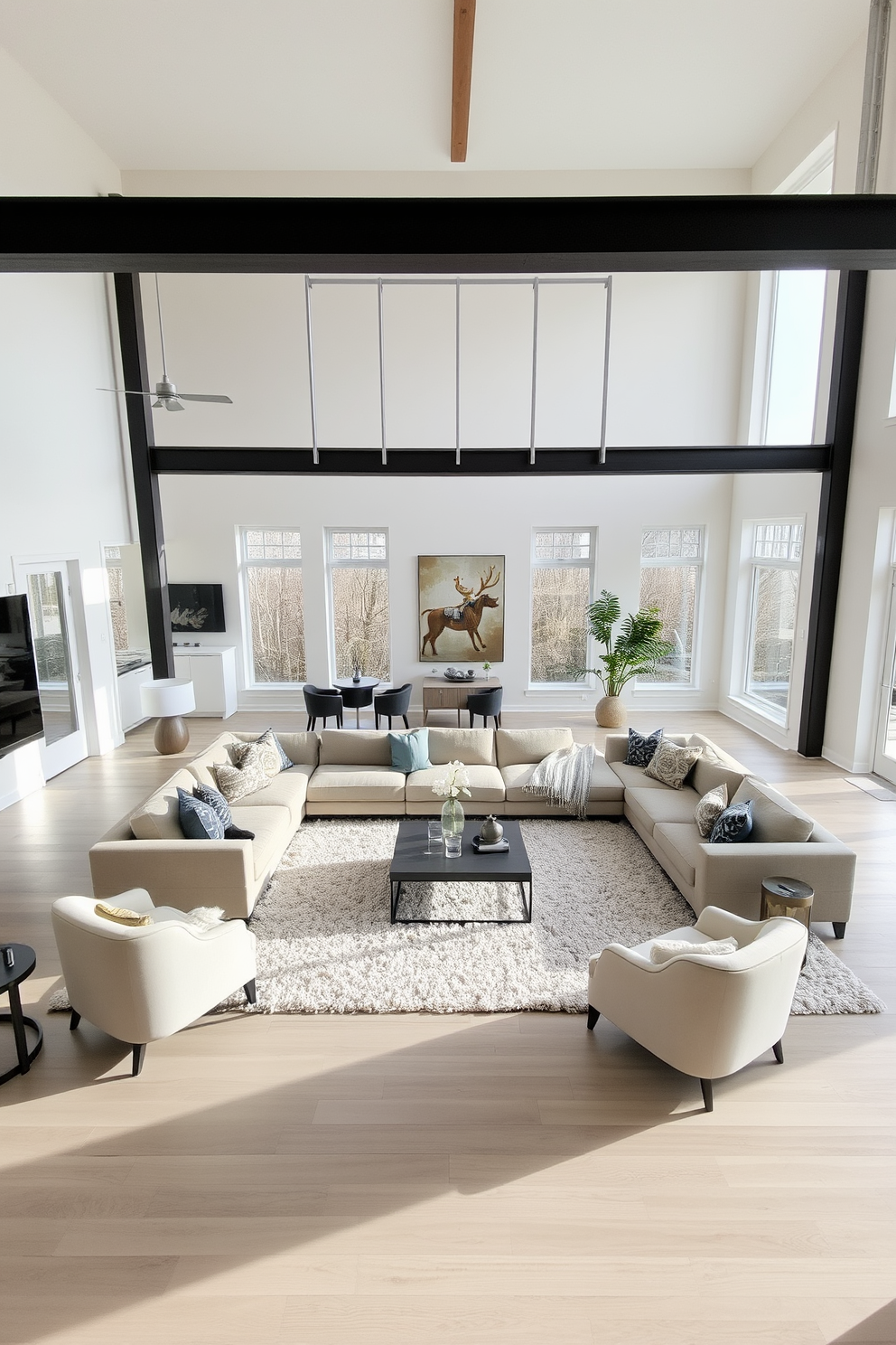 An open concept living room features a spacious layout with a large sectional sofa arranged to create a cozy gathering space. The walls are painted in a soft neutral tone, complemented by a plush area rug that anchors the seating area. Natural light floods the room through oversized windows, enhancing the airy atmosphere. Stylish decorative elements such as a coffee table and accent chairs complete the inviting design.