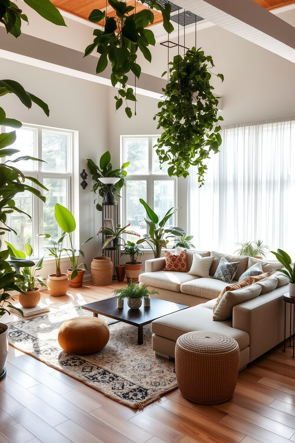 A spacious living room filled with natural light. Lush indoor plants are strategically placed around the room, enhancing the fresh atmosphere and creating a vibrant, inviting space. The seating area features a large, comfortable sectional sofa in a neutral tone. A stylish coffee table sits at the center, surrounded by decorative cushions and a soft area rug, adding warmth and texture to the design.