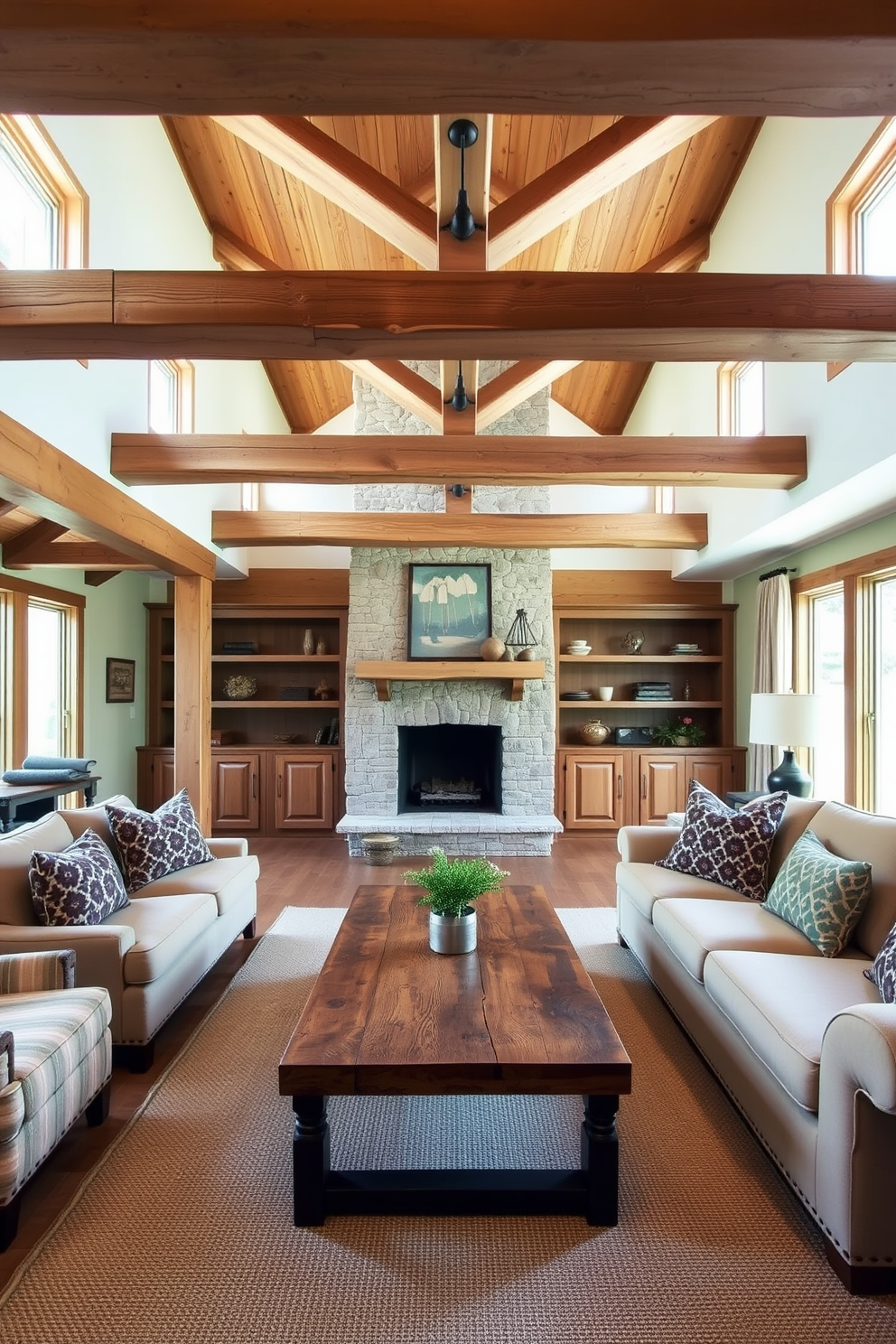 A spacious living room featuring rustic wooden beams that create a warm and inviting atmosphere. The room is filled with comfortable furniture, including a large sectional sofa and a reclaimed wood coffee table, complemented by a stone fireplace as the focal point.