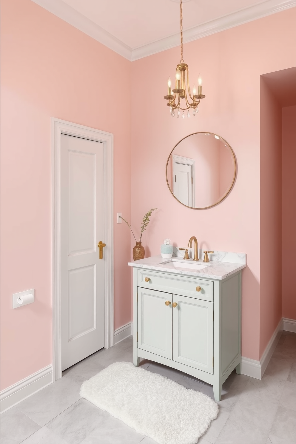 A large powder room designed with soft pastel colors creates a calming atmosphere. The walls are painted in a gentle blush pink, complemented by a delicate mint green vanity with a white marble top. A round mirror with a thin gold frame hangs above the vanity, reflecting the light from a stylish chandelier. The floor is adorned with light gray tiles, and a plush white rug adds a touch of comfort underfoot.