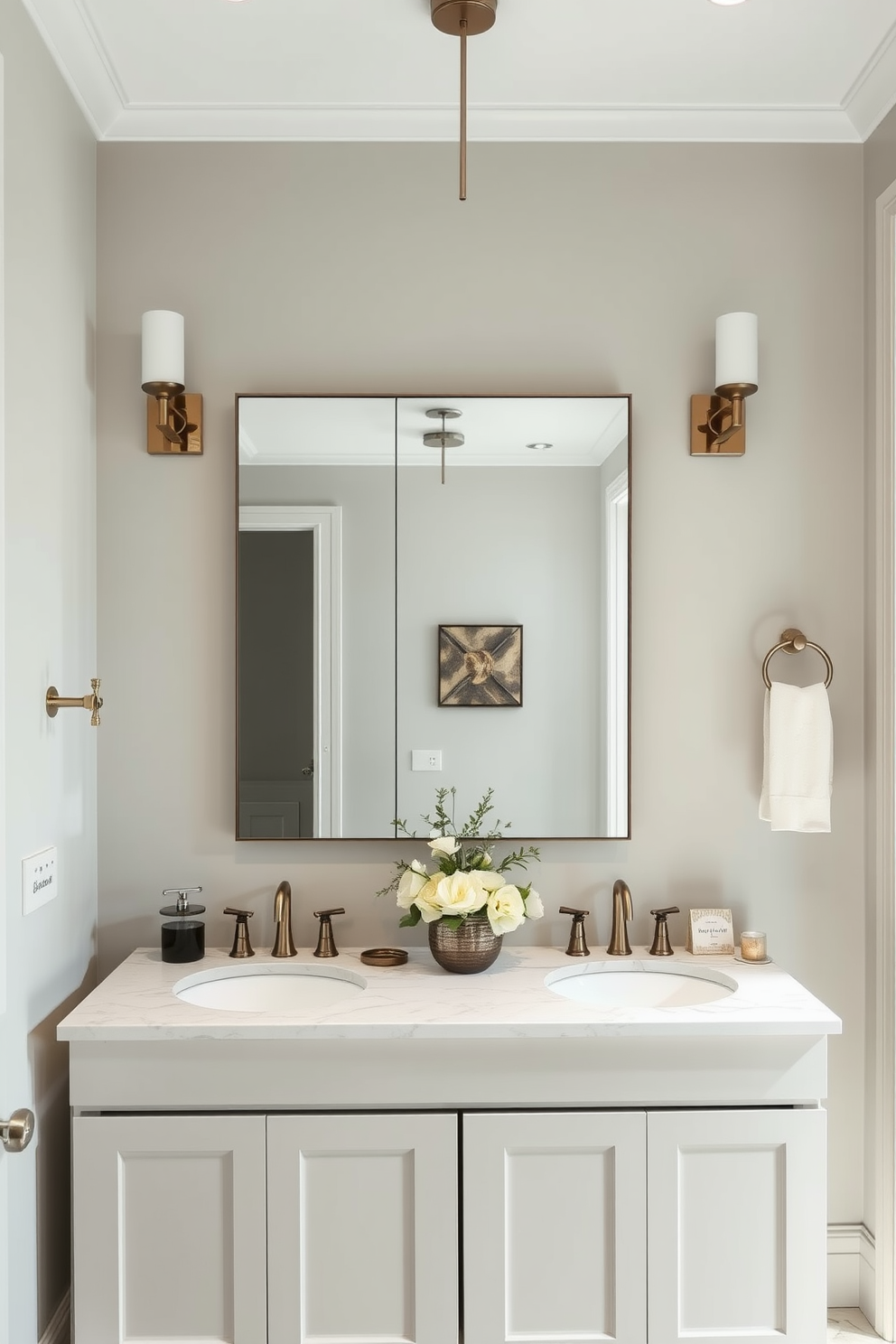 A large powder room featuring wall-mounted faucets that create a sleek and modern appearance. The space is adorned with elegant finishes, including a statement mirror and stylish lighting fixtures that enhance the overall ambiance. The walls are painted in a soft neutral tone, complemented by a chic vanity with a marble countertop. Decorative elements such as fresh flowers and tasteful accessories add a touch of sophistication to the design.