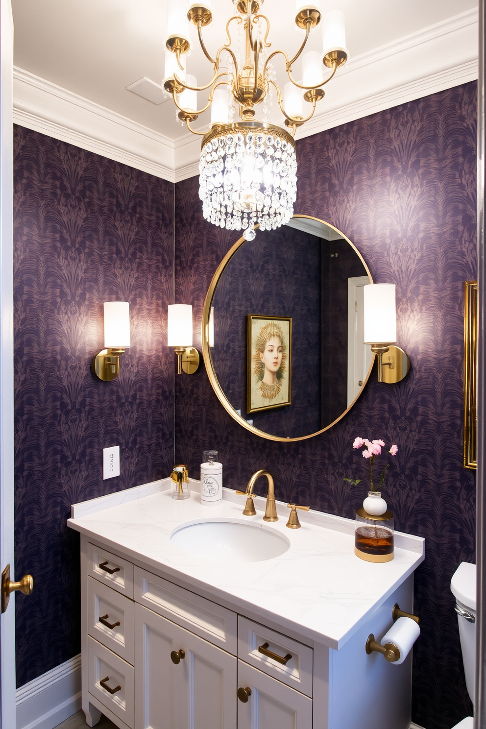 A large powder room features a stunning chandelier that casts a warm glow across the space. The walls are adorned with a rich navy wallpaper, and a sleek white marble countertop complements the elegant fixtures. The vanity is framed by stylish sconces that provide additional illumination. A large round mirror reflects the light and enhances the room's spacious feel, while decorative elements add a touch of personality.