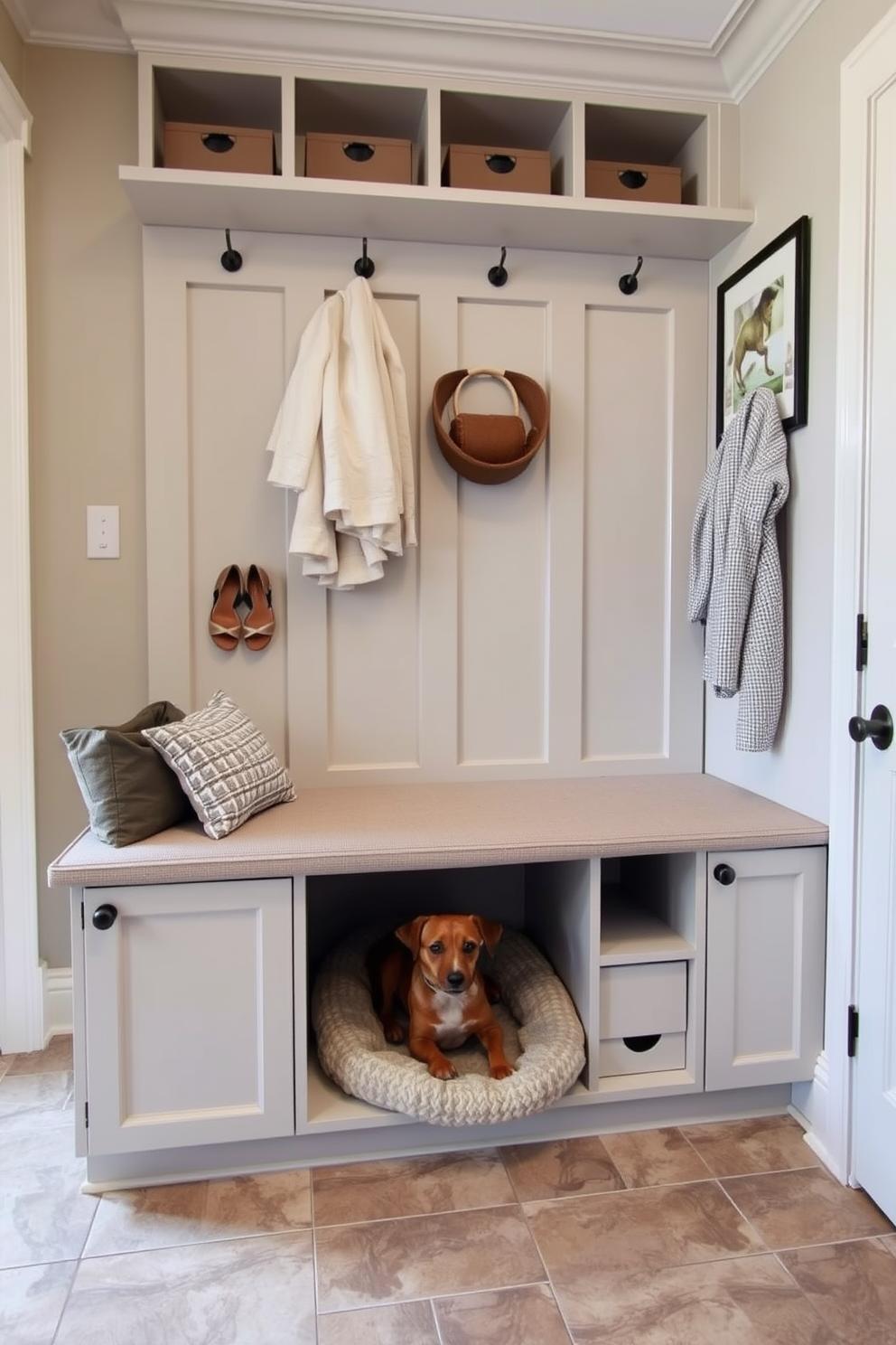 A functional mudroom with a hidden pet area beneath a stylish bench. The bench is upholstered in a durable fabric, and the space features built-in storage for shoes and outdoor gear. The hidden pet area includes a cozy bed and feeding station discreetly integrated into the design. Soft, neutral colors and practical tile flooring add to the overall aesthetic while ensuring easy maintenance.