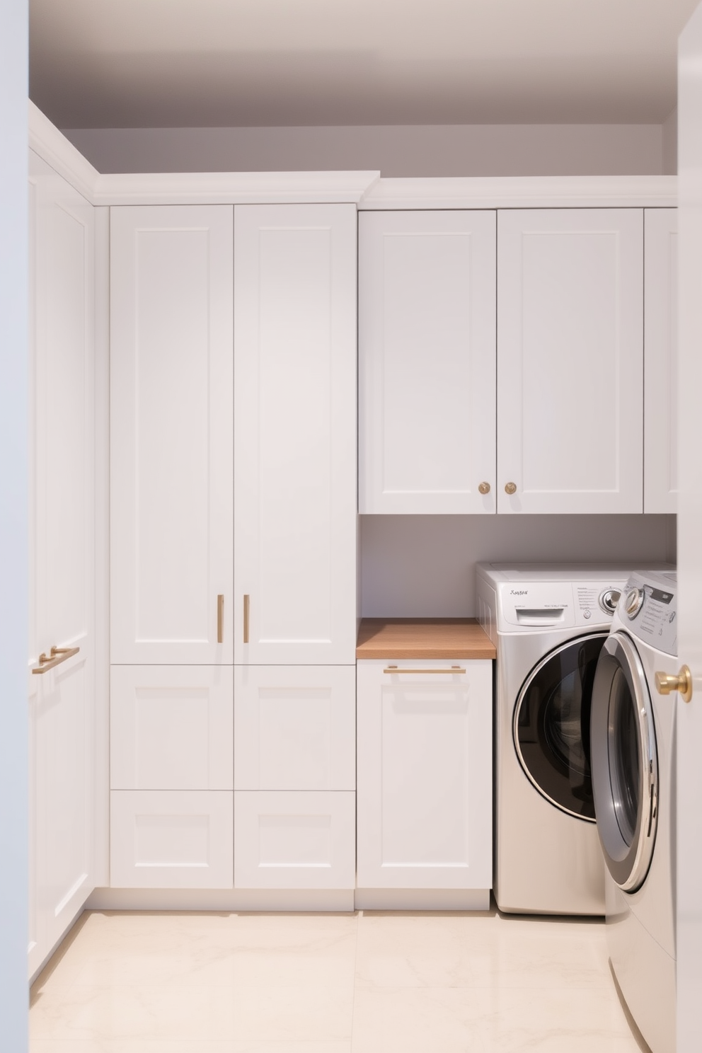 A modern laundry room featuring cabinets with integrated lighting that highlights the sleek design. The cabinets are painted in a soft white finish with brushed nickel handles, providing a clean and functional look. The integrated lighting illuminates the countertop space, making it easy to sort and fold laundry. A stylish backsplash in a subtle geometric pattern adds a touch of elegance to the overall design.