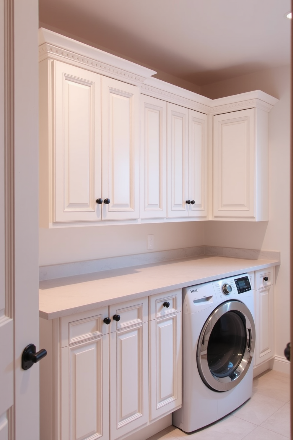 Contemporary cabinets with sleek handles create a modern and functional laundry room. The cabinets are finished in a soft white hue, providing a clean and bright atmosphere while maximizing storage space.