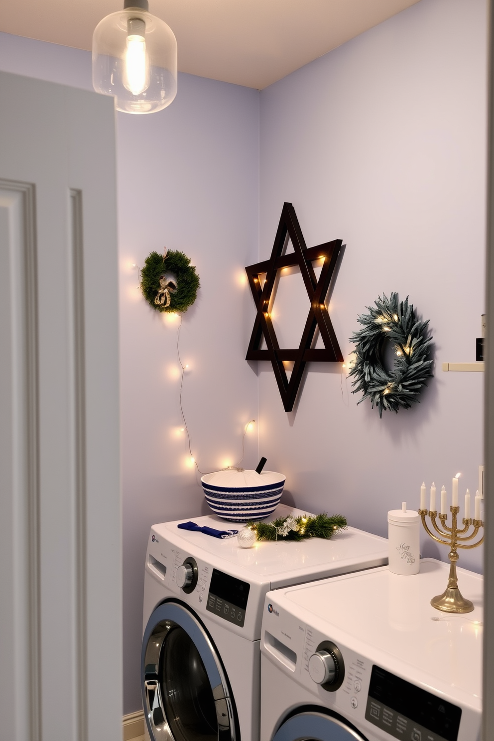 A cozy laundry room featuring a prominent Star of David wall art decoration. The walls are painted in a soft blue hue, and the space is adorned with festive Hanukkah decorations, including string lights and a menorah on the countertop.