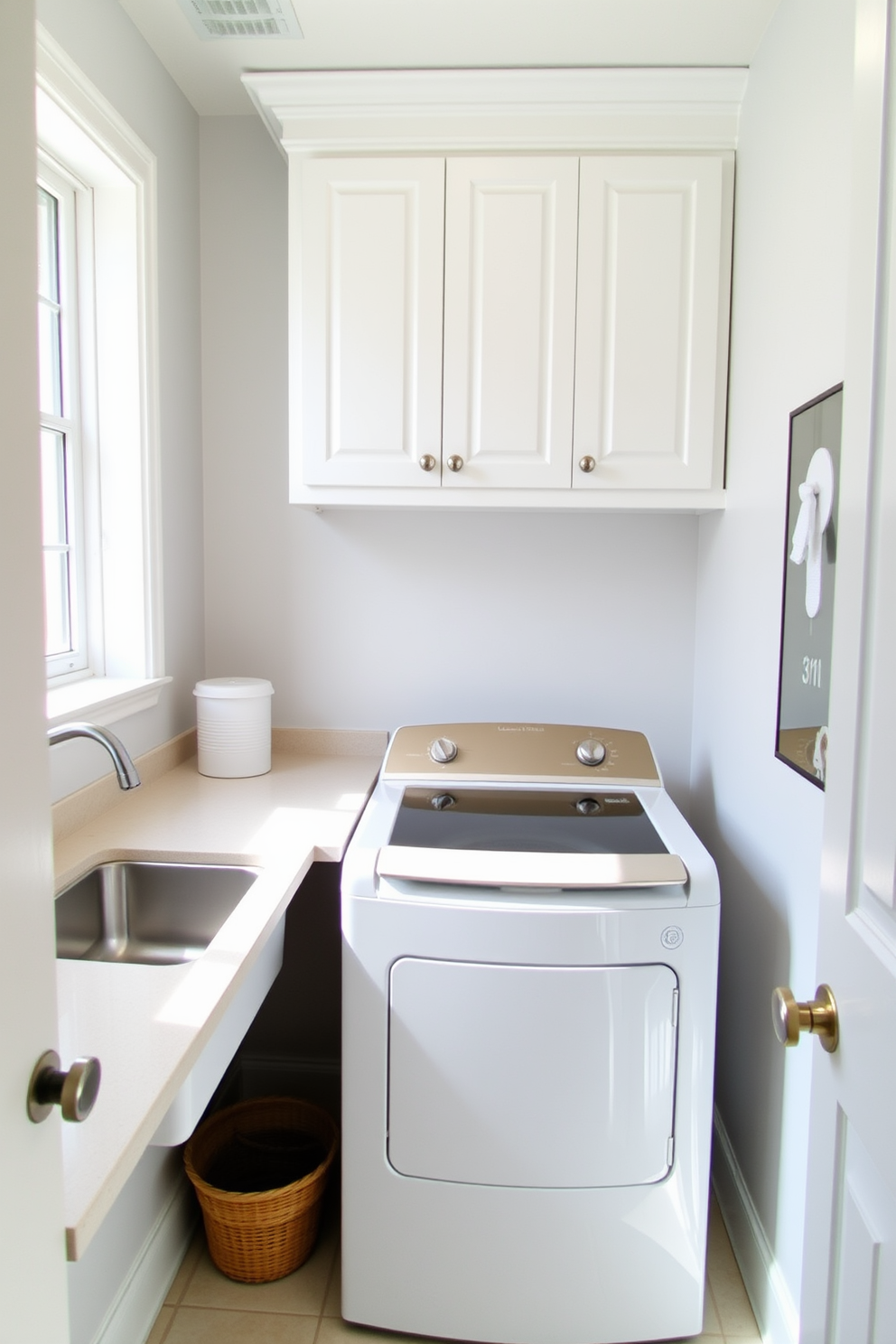 A modern minimalist laundry room featuring a top-loading washer seamlessly integrated into sleek cabinetry. The space is adorned with a neutral color palette, complemented by ample natural light streaming through a large window.