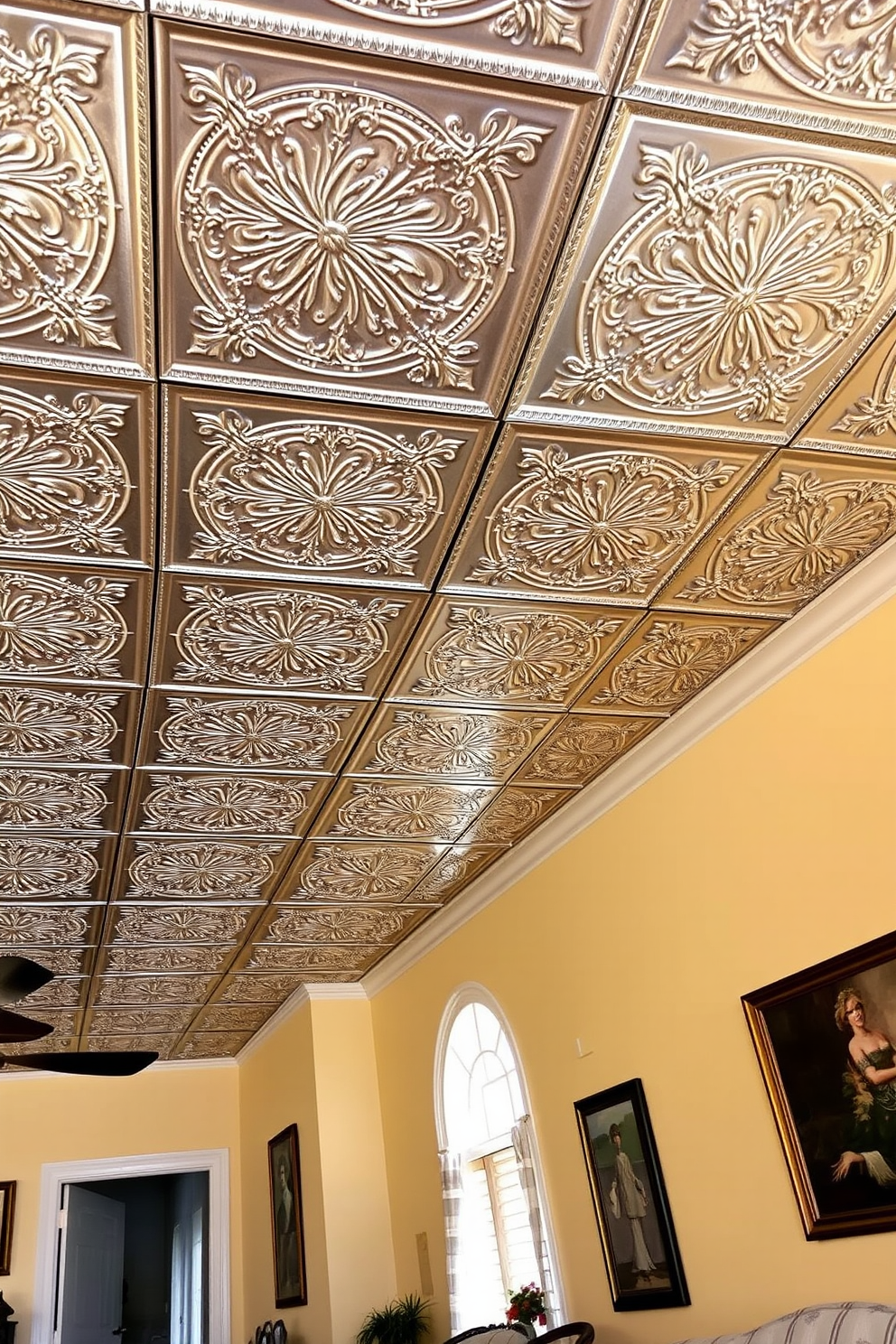 A vibrant living room features an intricate ceiling medallion painted in a mix of bold colors that draw the eye upward. The medallion is surrounded by soft, white crown molding that enhances the overall elegance of the space. The ceiling design incorporates a harmonious blend of textures and patterns that complement the room's decor. Elegant lighting fixtures hang gracefully from the center, casting a warm glow that highlights the colorful accents.