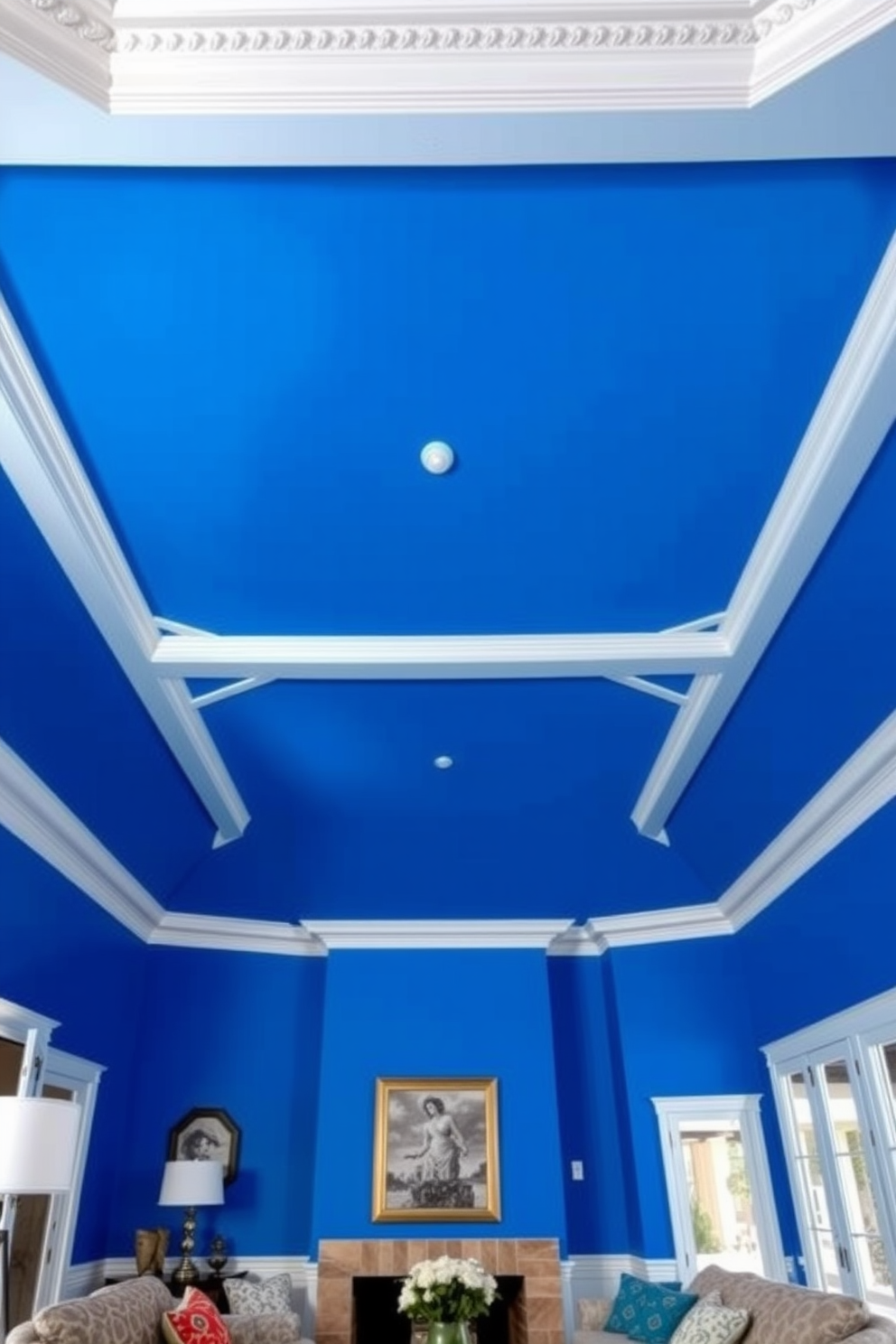 A striking living room ceiling painted in a bold cerulean blue creates a vibrant focal point. The ceiling features intricate white crown molding that adds an elegant contrast to the vivid color. Soft, ambient lighting is integrated into the ceiling design, enhancing the overall atmosphere of the space. Plush furnishings in complementary tones are arranged below, inviting relaxation and conversation.