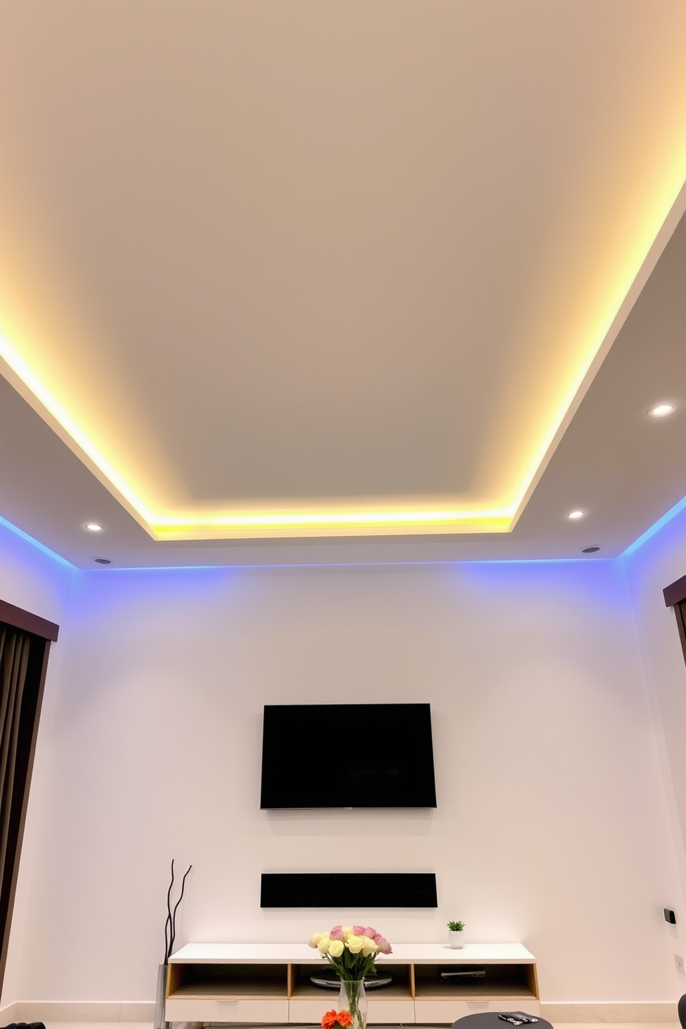 A modern living room featuring recessed lighting that creates a clean and open atmosphere. The ceiling is designed with sleek lines and a minimalist aesthetic, incorporating subtle LED strips for a warm ambiance.