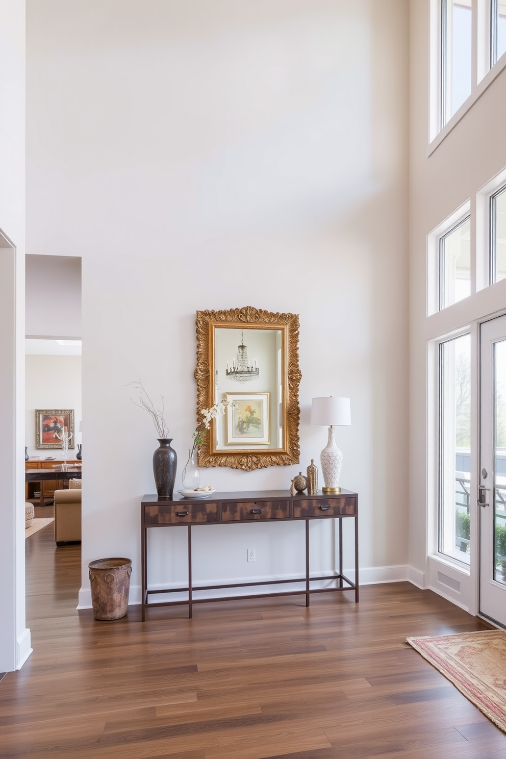 An elegant area rug in a soft cream color anchors the living room, complementing the rich hardwood flooring. The rug features intricate patterns that add texture and warmth, creating a cozy atmosphere for gatherings. In the entryway, a stylish console table made of reclaimed wood stands against the wall, adorned with a decorative mirror above it. Fresh greenery in a ceramic pot adds a touch of life, while a small, woven basket beneath the table provides functional storage for shoes and accessories.