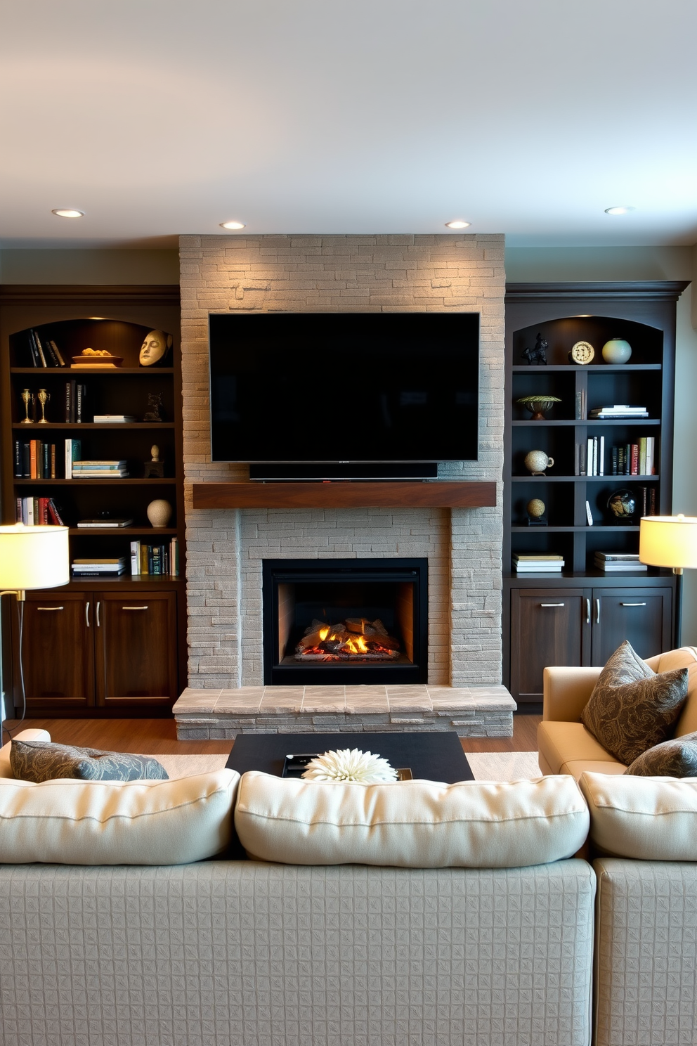 A cozy living room featuring exposed wood beams that frame a modern fireplace. The fireplace is set against a textured stone wall, and a sleek flat-screen TV is mounted above it, creating a warm focal point for the space.