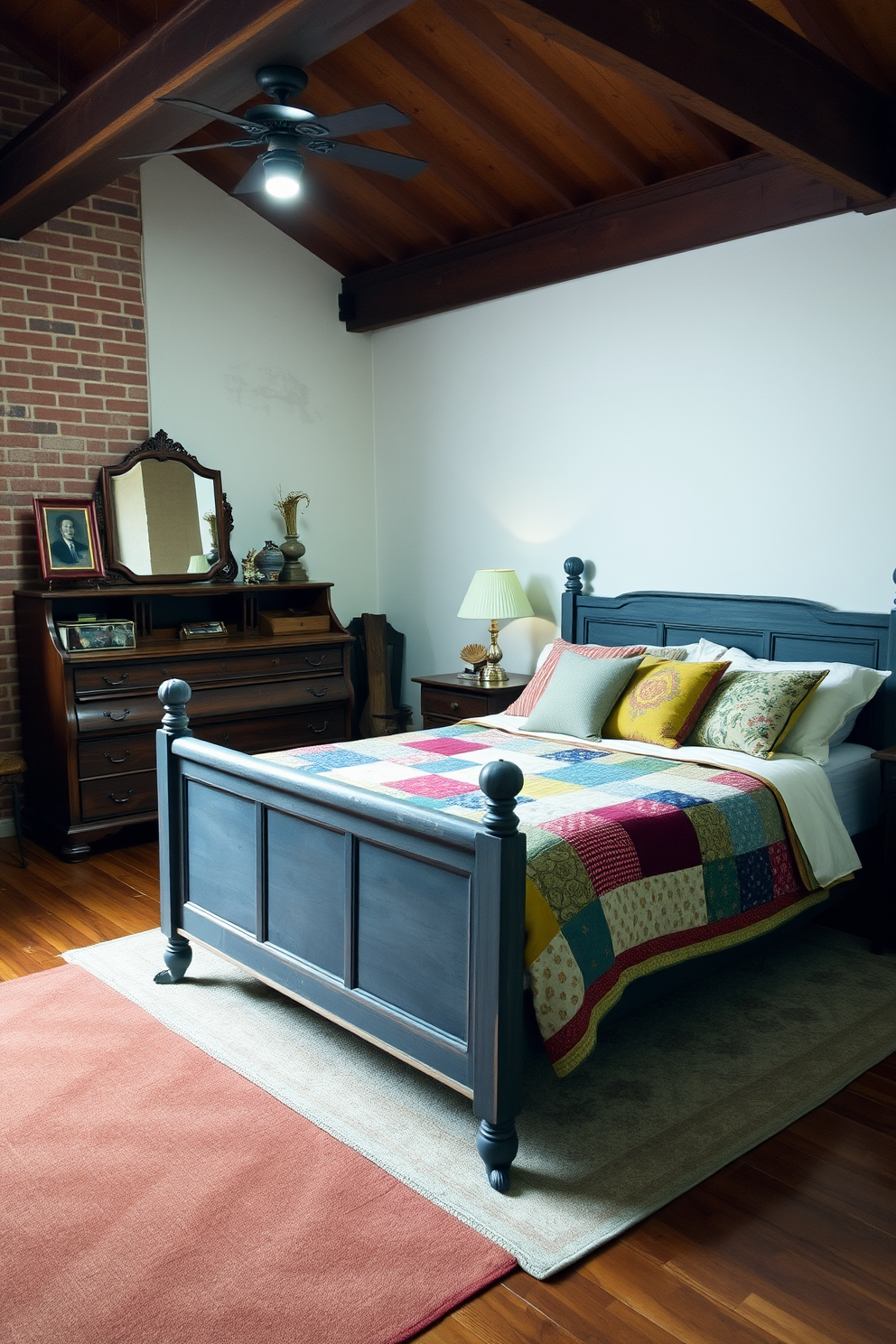 A cozy loft bedroom features vintage furniture that exudes charm and warmth. A distressed wooden bed frame is paired with a patchwork quilt and an assortment of colorful throw pillows. An antique dresser stands against the wall, showcasing decorative items and a vintage mirror above it. Exposed brick walls and wooden beams add to the rustic ambiance, while a soft area rug anchors the space.