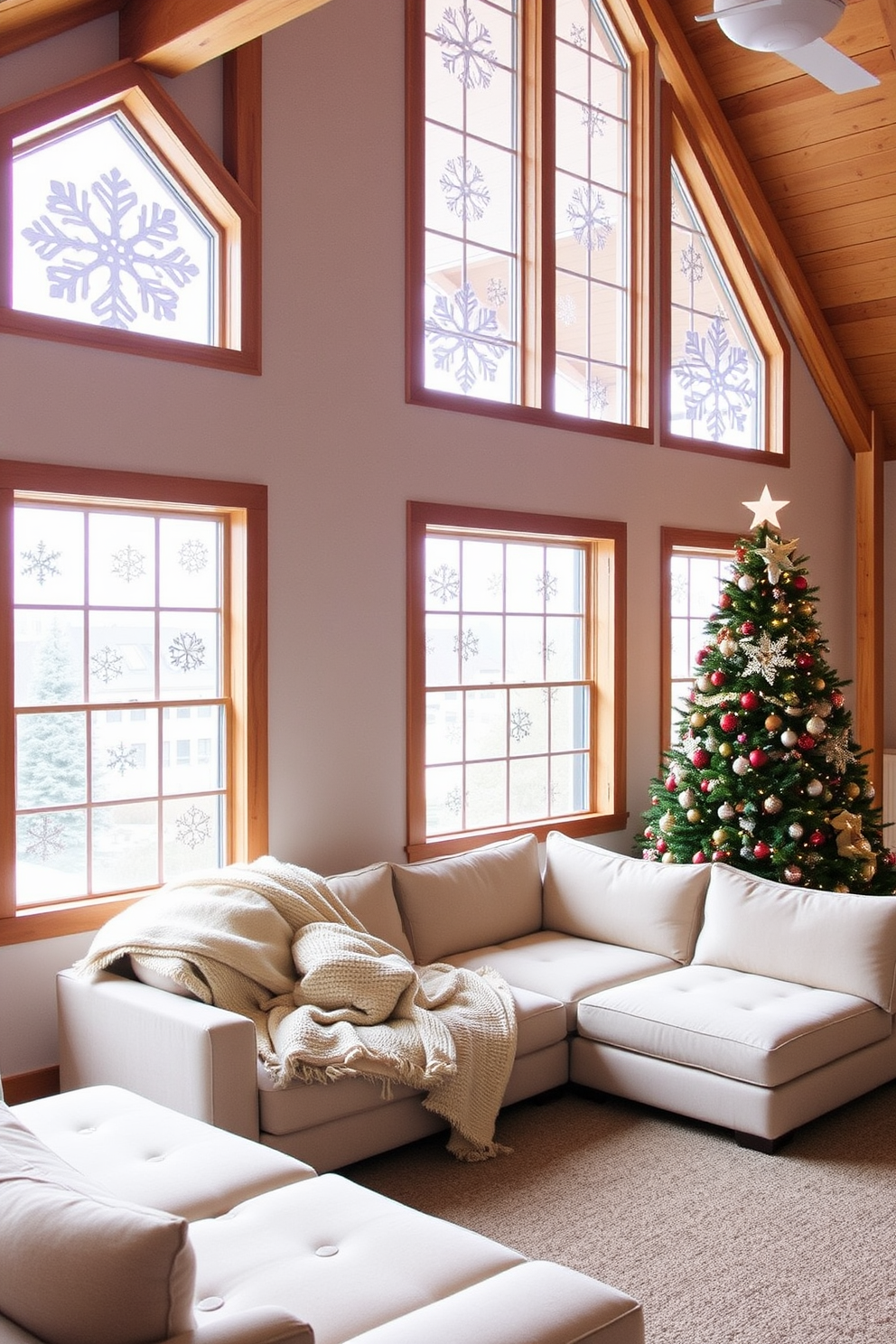 Create a cozy loft space decorated for Christmas with snowflake cutouts adorning the large windows. The room features a plush sectional sofa draped with soft blankets and a beautifully adorned Christmas tree in the corner.