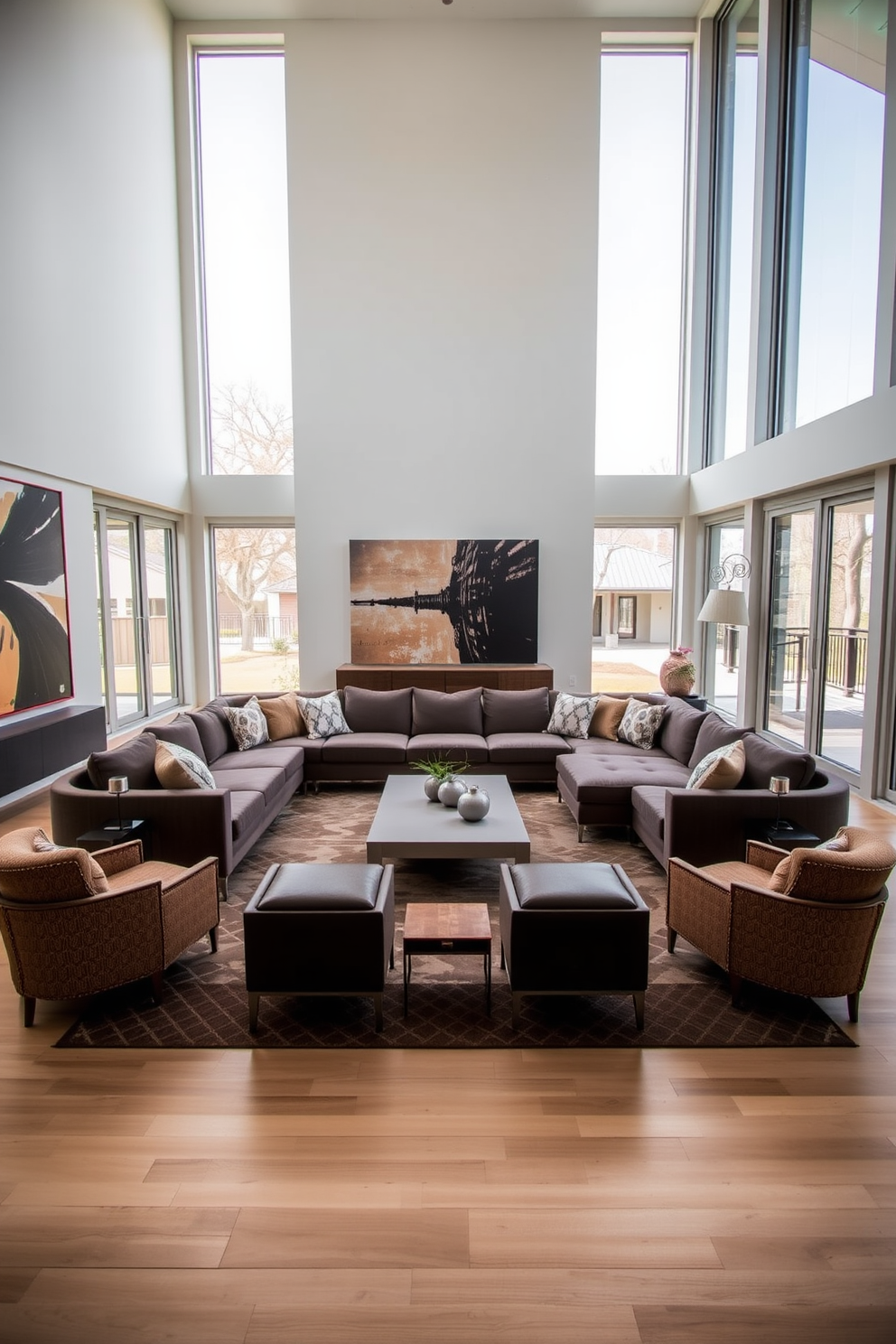 A long living room features a sectional sofa placed at an angle to create a dynamic focal point. A sleek coffee table sits in the center, complemented by two accent chairs positioned diagonally across from the sofa. The walls are adorned with large artwork that draws the eye, while a stylish area rug anchors the seating area. Floor-to-ceiling windows allow natural light to flood the space, enhancing the warm color palette of soft neutrals and rich browns.